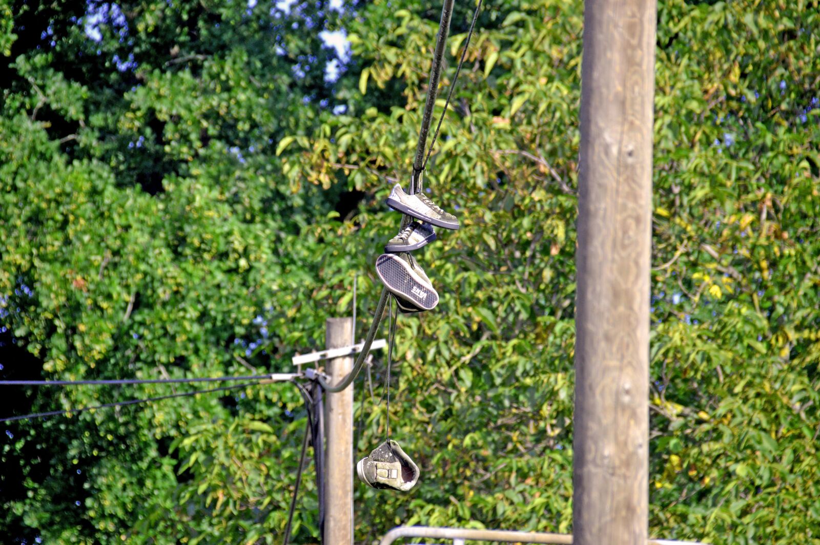 Nikon D3200 sample photo. Shoes, fun, power line photography