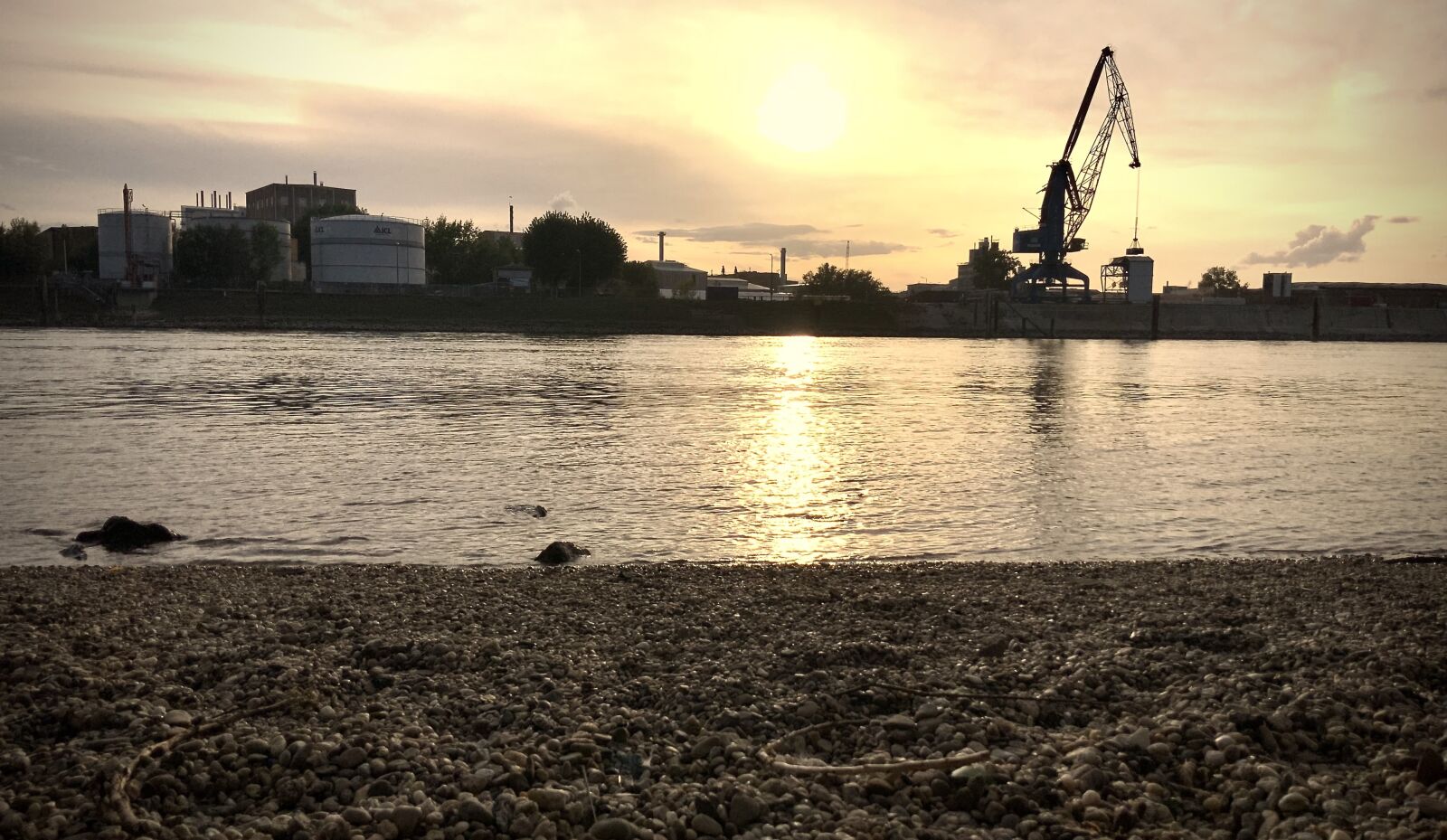 iPad Pro (11-inch) back camera 3mm f/1.8 sample photo. Sunset, beach, industrial photography