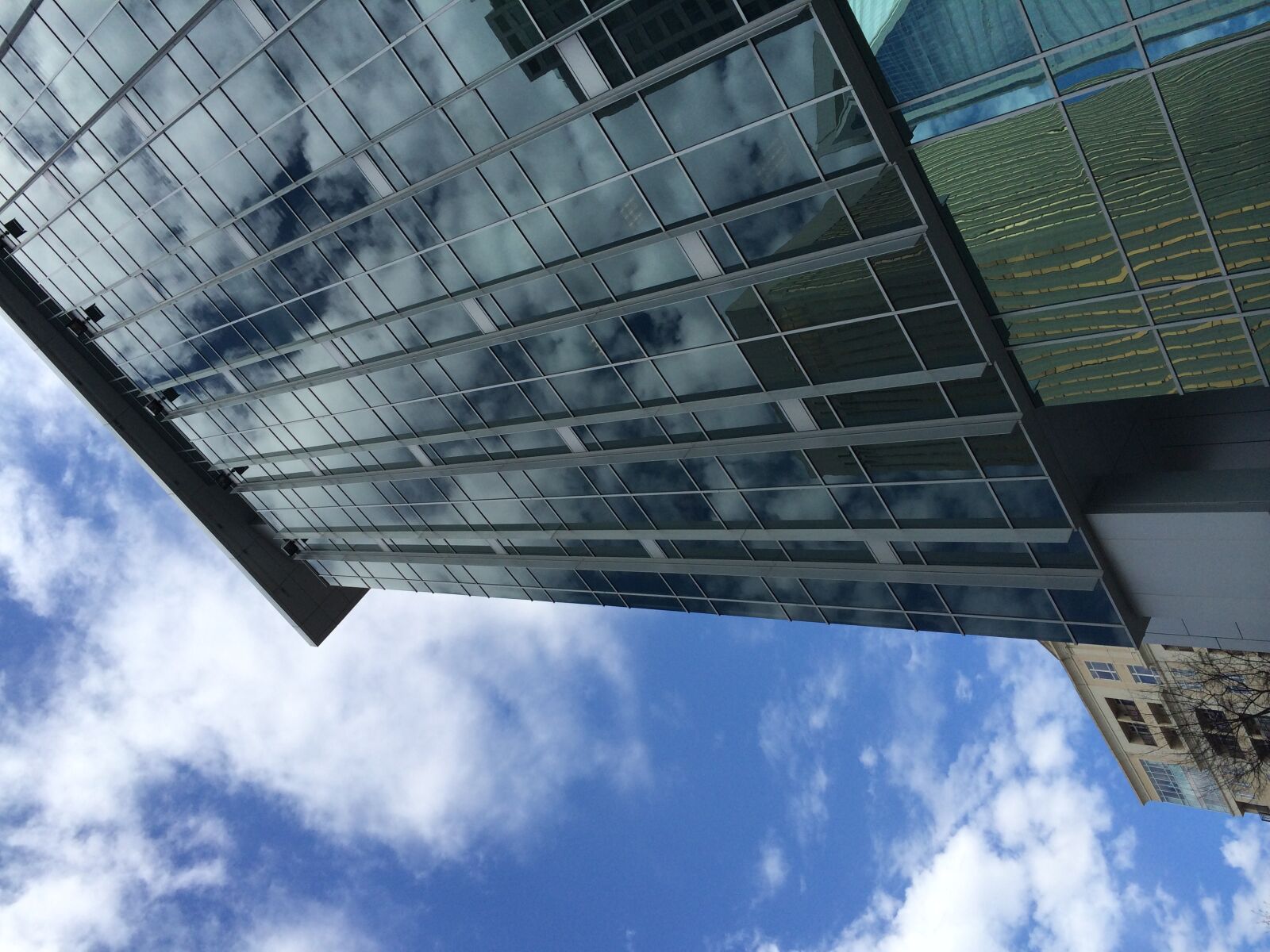 Apple iPhone 5s sample photo. Reflection, sky, skyscrapers, sunny photography
