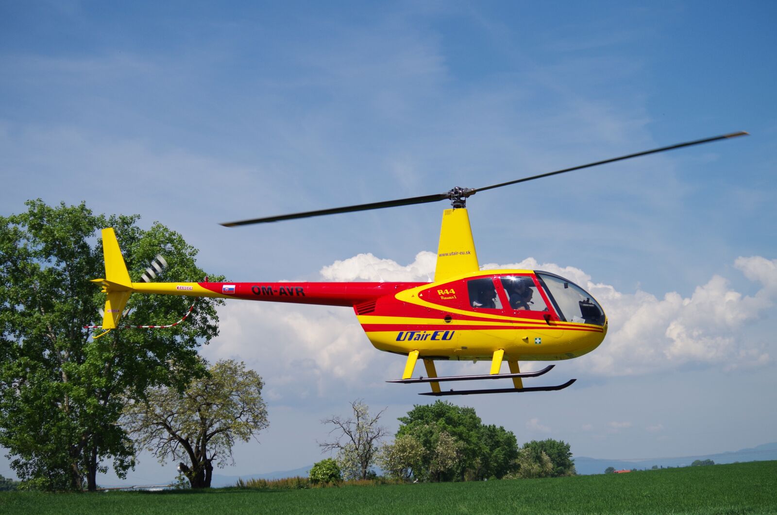 Pentax K-500 sample photo. Helicopter, flies, the sky photography