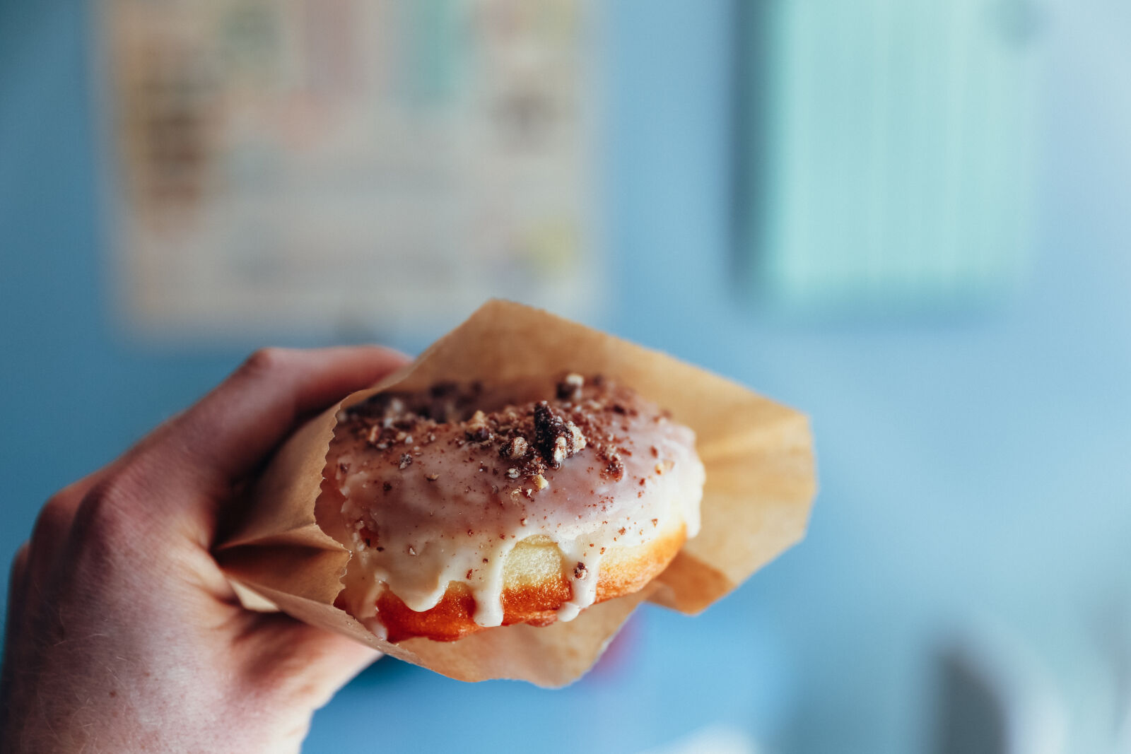 Canon EF 24-70mm F2.8L II USM sample photo. Person, holding, doughnut photography