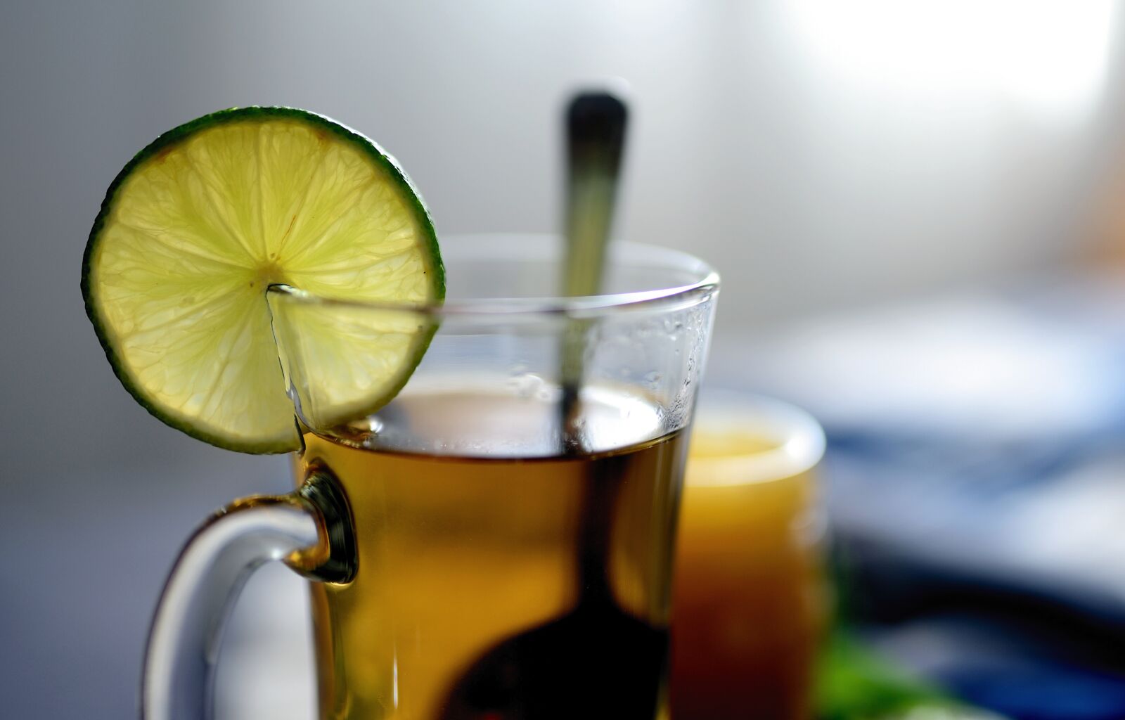 Nikon D610 sample photo. Lime, tee, herbal tea photography