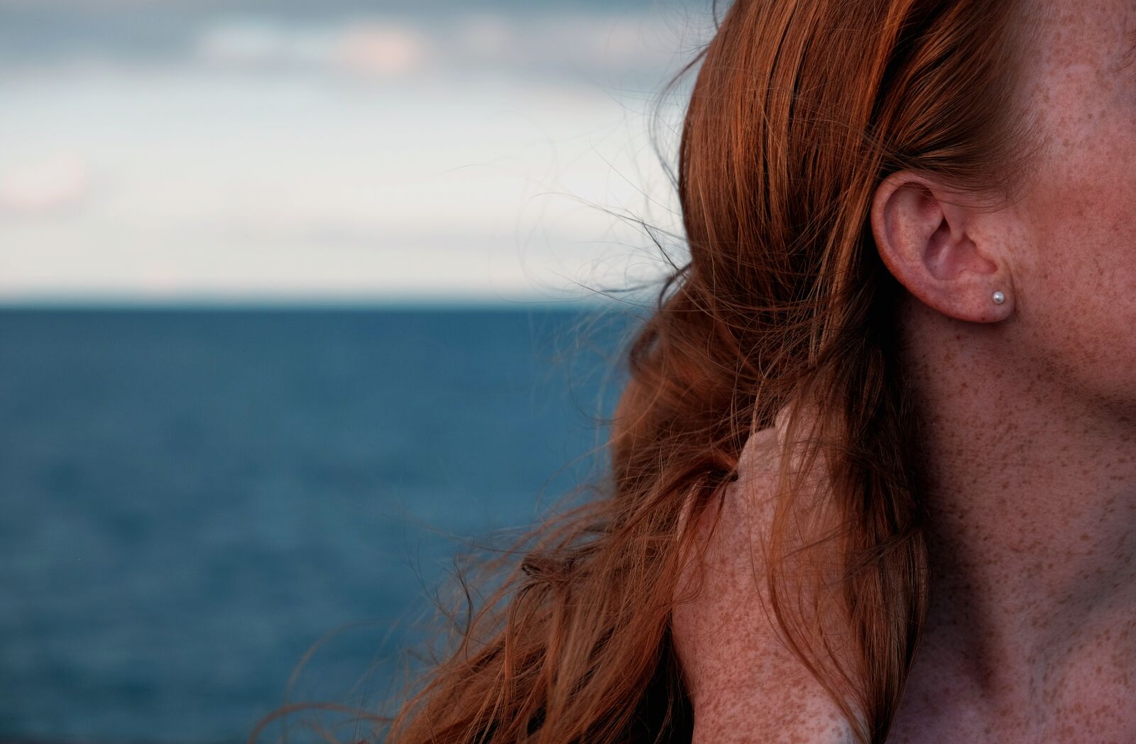 Fujifilm X-T1 sample photo. Freckles, hair, ocean, redhead photography