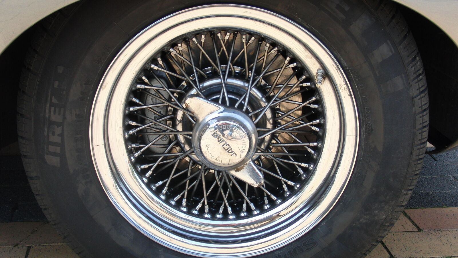 CASIO EX-FC100 sample photo. Car rim, auto tires photography