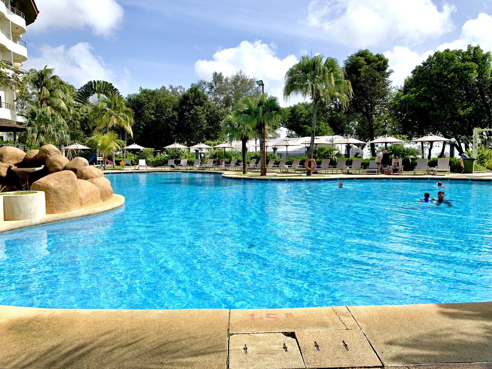 iPhone XS back dual camera 4.25mm f/1.8 sample photo. Blue, pool, hotel photography