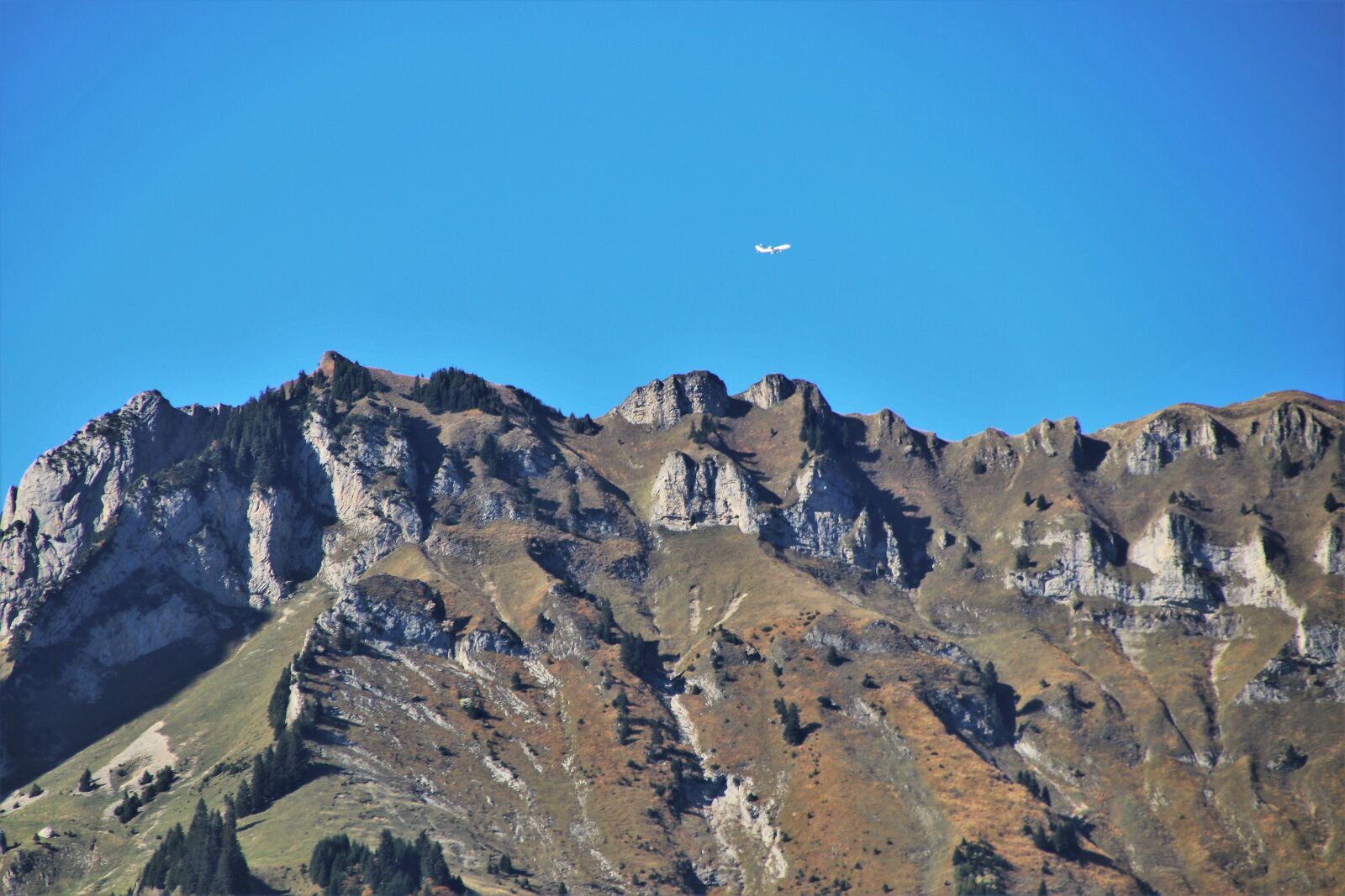Canon EOS 80D sample photo. The plane, mountains, rocks photography