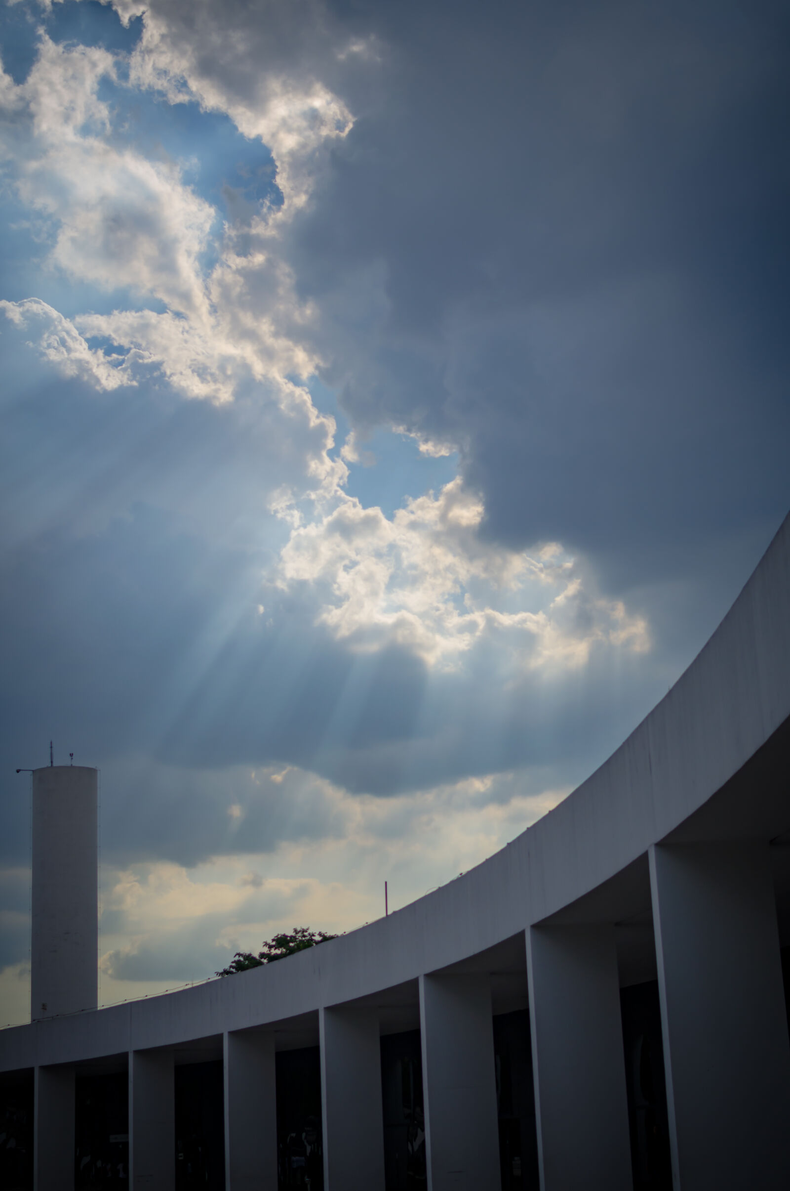 Nikon D5100 + Nikon AF-S DX Nikkor 35mm F1.8G sample photo. Clouds, semi, arc, sky photography