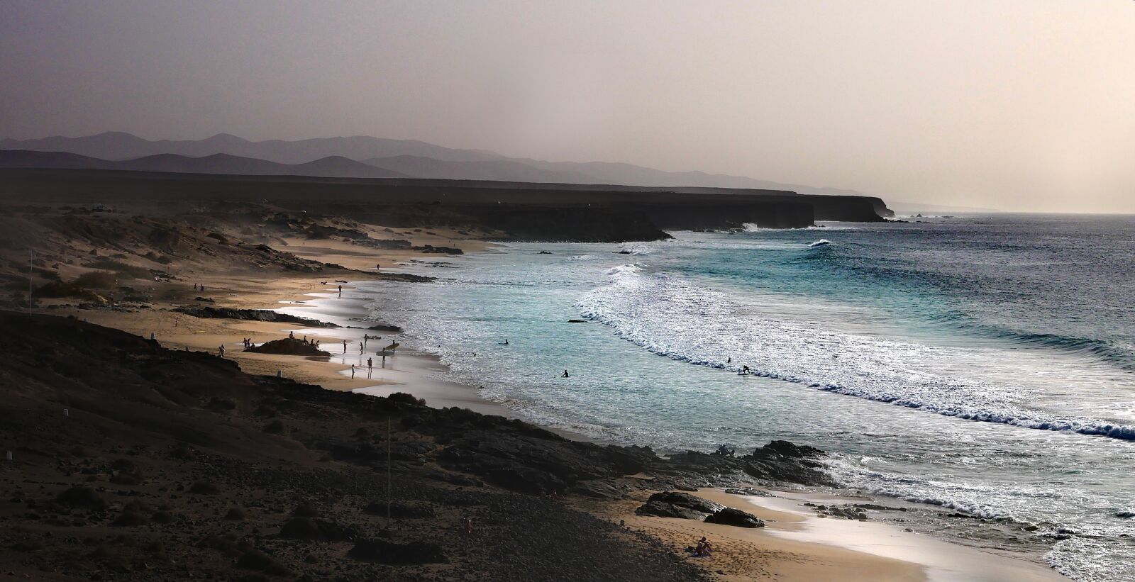 Panasonic Lumix DMC-GX85 (Lumix DMC-GX80 / Lumix DMC-GX7 Mark II) sample photo. Beach, surf, against daylight photography