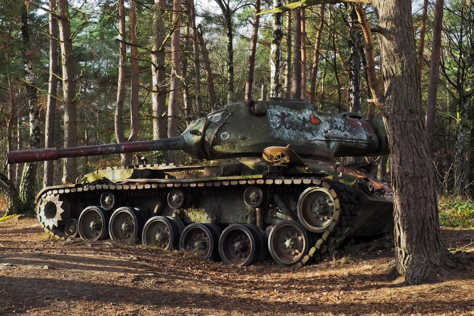 Olympus OM-D E-M10 sample photo. Lost places, panzer, wreck photography