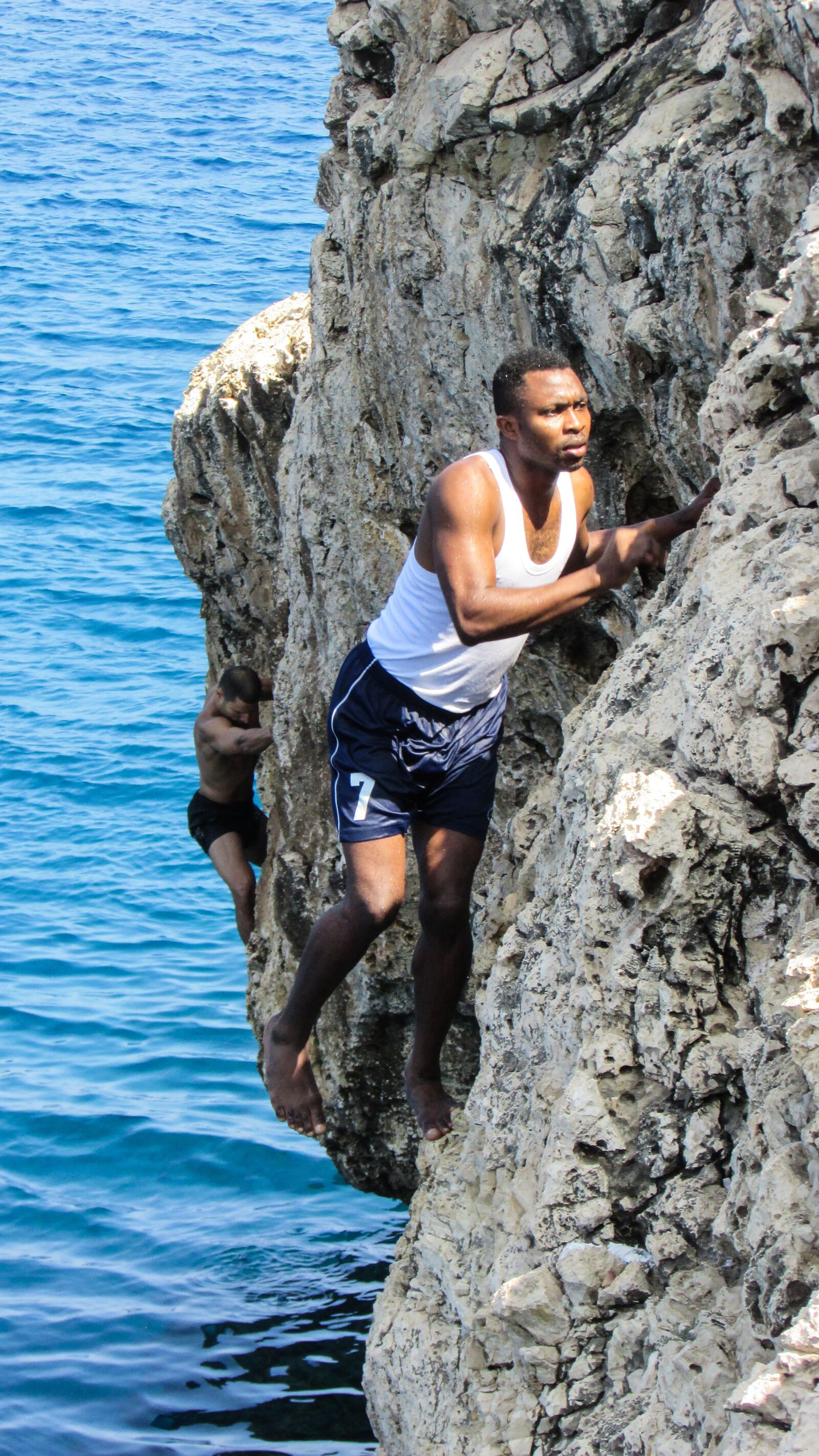 Canon PowerShot SX400 IS sample photo. Climbing, rock, sea photography