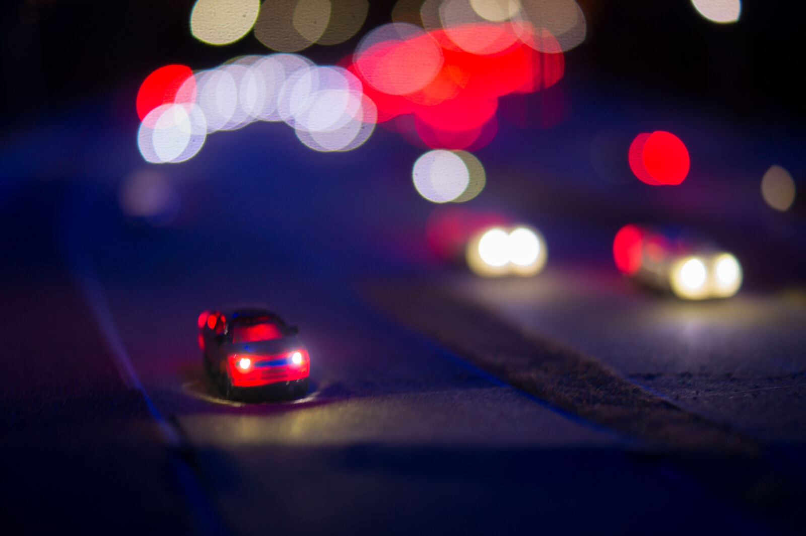 Sony DT 35mm F1.8 SAM sample photo. Traffic, lights, car, toys photography