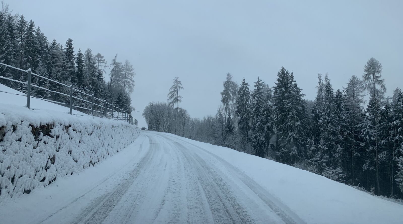 iPhone XR back camera 4.25mm f/1.8 sample photo. Road, mountains, clouds photography