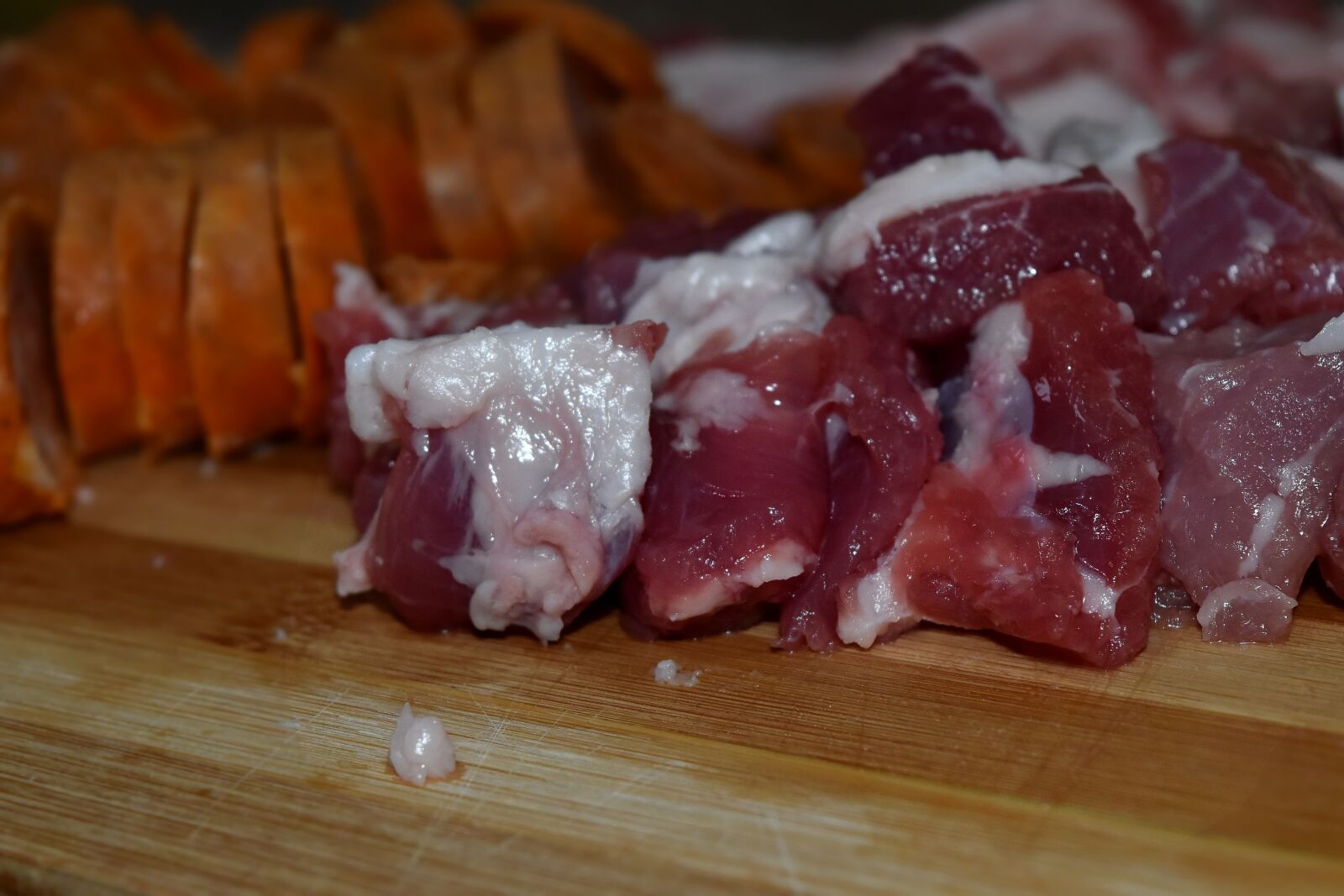 Nikon D5500 sample photo. Fat, raw meat, sausage photography