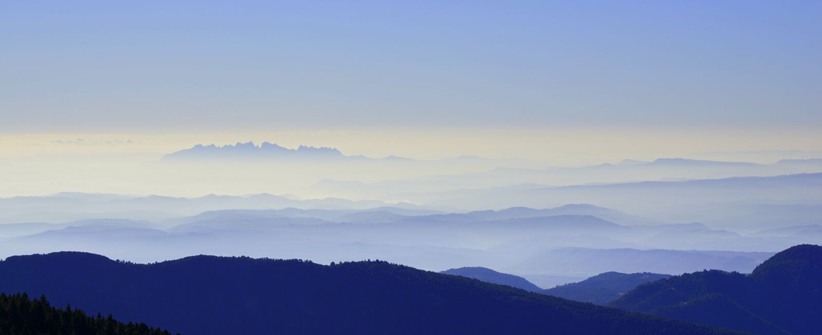 Sony E 55-210mm F4.5-6.3 OSS sample photo. Mist, montserrat, landscape photography