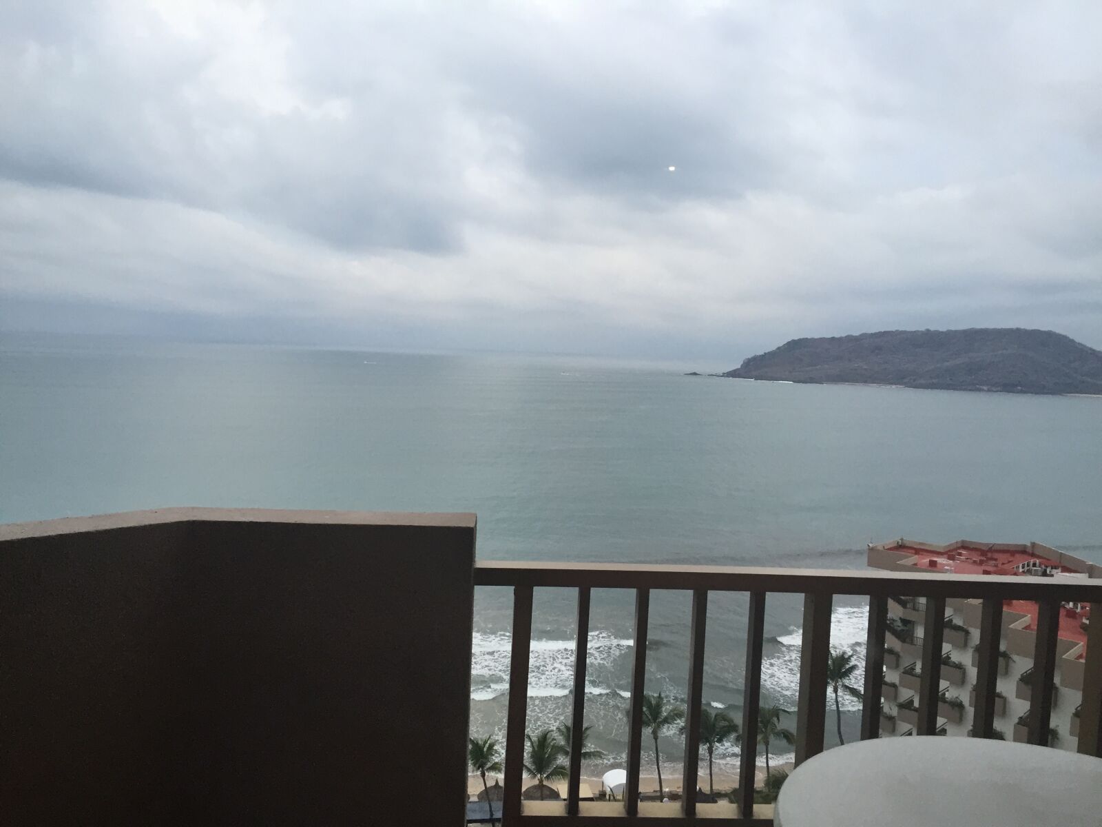 iPhone 6 back camera 4.15mm f/2.2 sample photo. Cloudy, mexico, ocean, resort photography