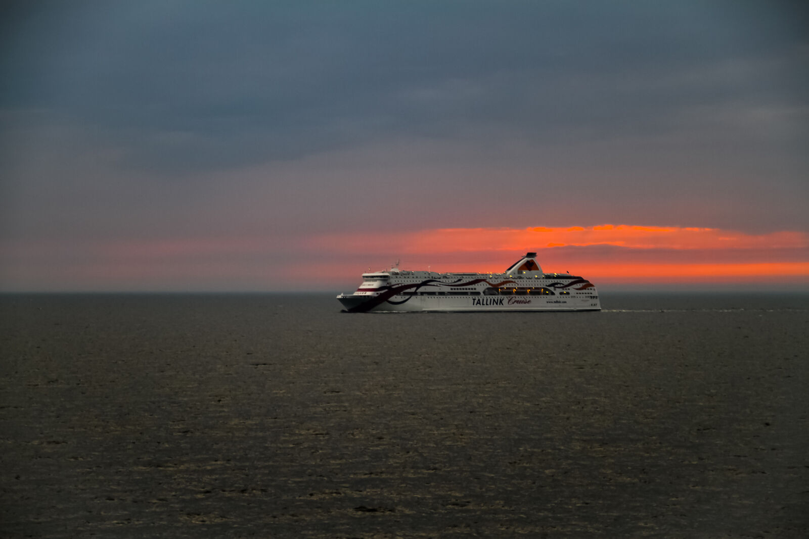 Sigma 17-70mm F2.8-4 DC Macro OS HSM sample photo. Ferry, sea, sunset photography