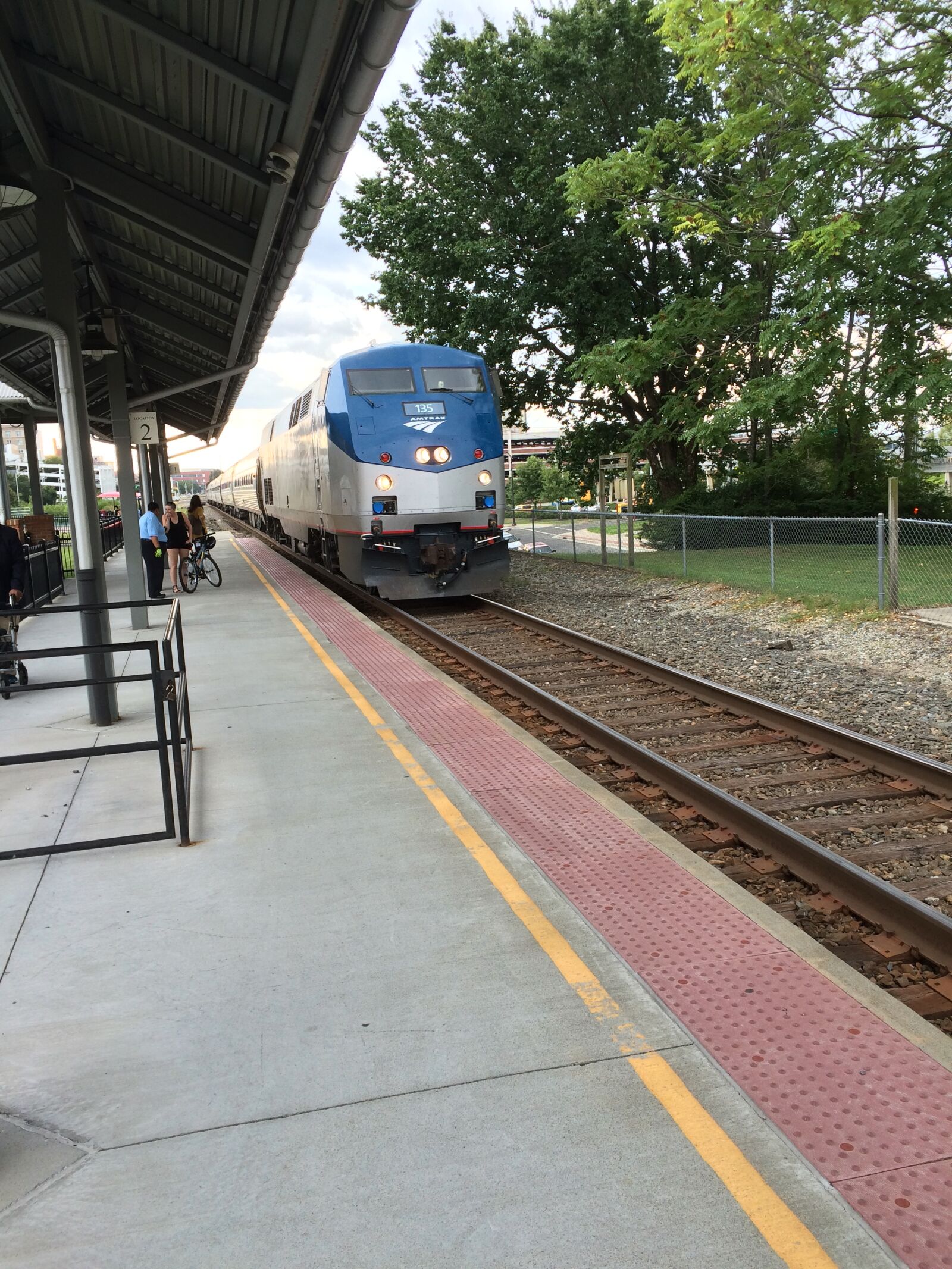 iPhone 5s back camera 4.15mm f/2.2 sample photo. All, aboard, amtrak, arrival photography