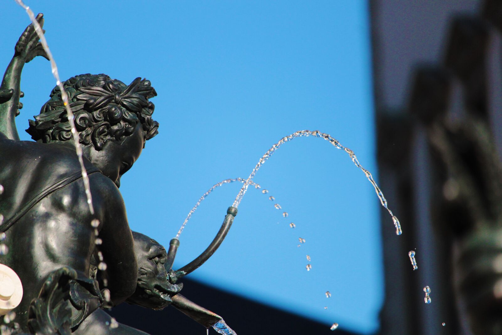 Canon EF-S 55-250mm F4-5.6 IS STM sample photo. Fountain, augsburg, cherub photography