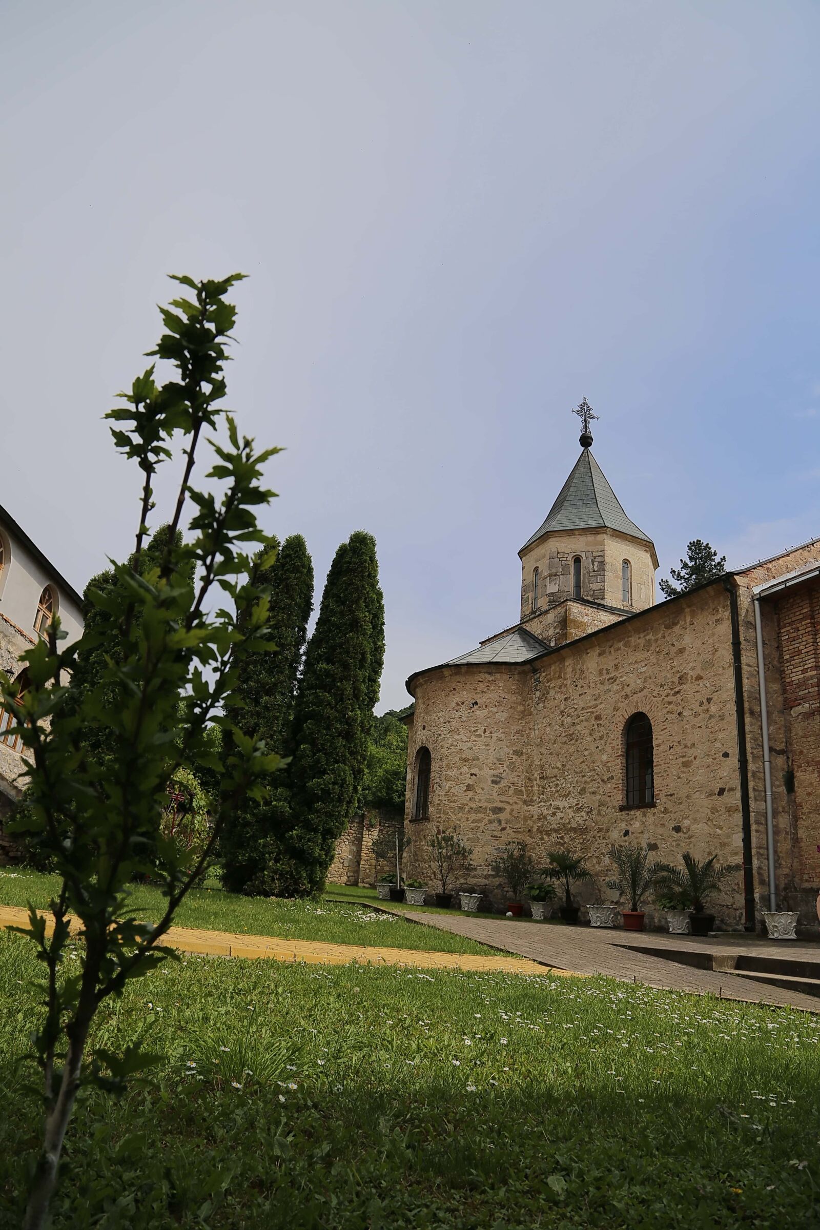 Canon EF 24-105mm F4L IS USM sample photo. Medieval, monastery, backyard, church photography