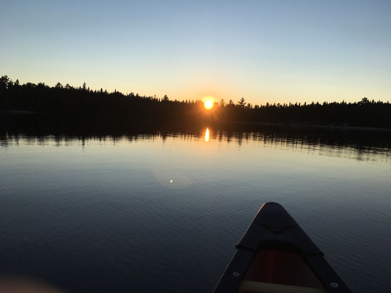 iPhone SE back camera 4.15mm f/2.2 sample photo. Canoe, lake, water photography