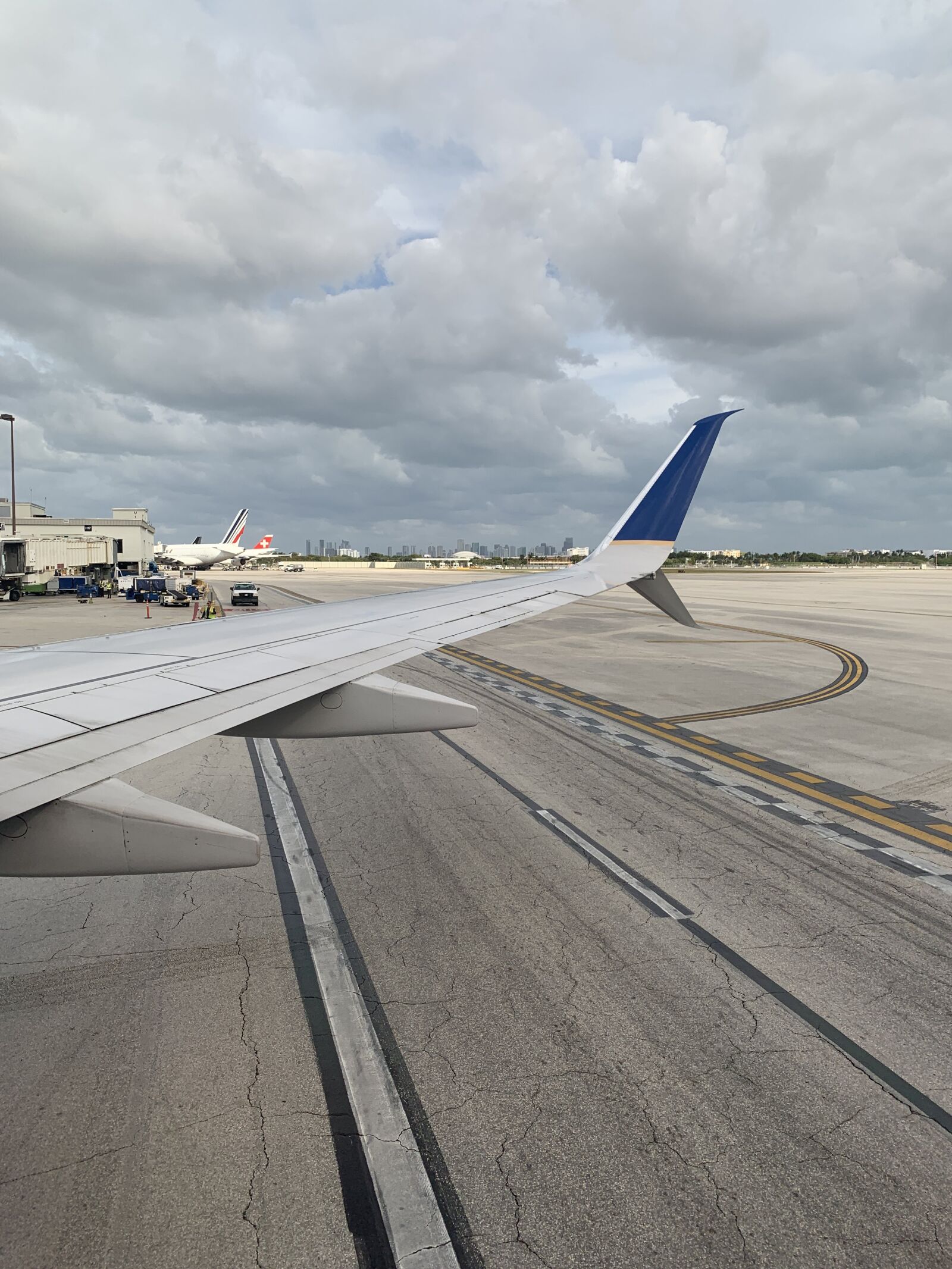 Apple iPhone XR sample photo. Airplane, airplane taxi, airport photography