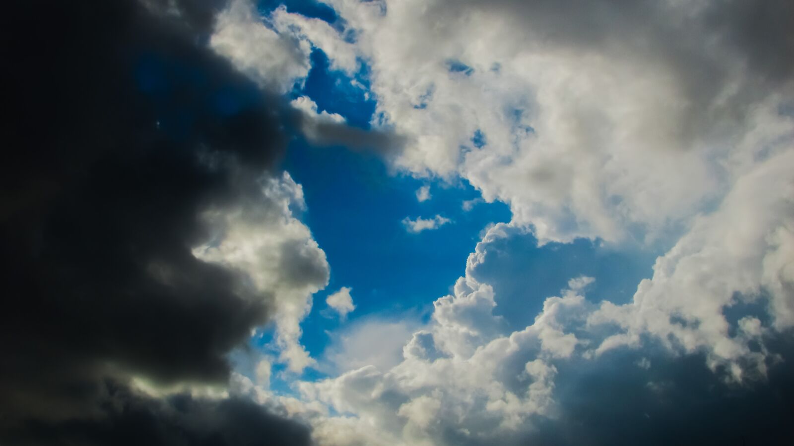 Canon PowerShot SX400 IS sample photo. Clouds, sunlight, sky photography