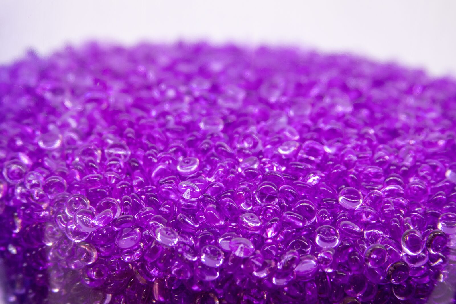 Canon EF 28-135mm F3.5-5.6 IS USM sample photo. Purple beads, glass, glitter photography