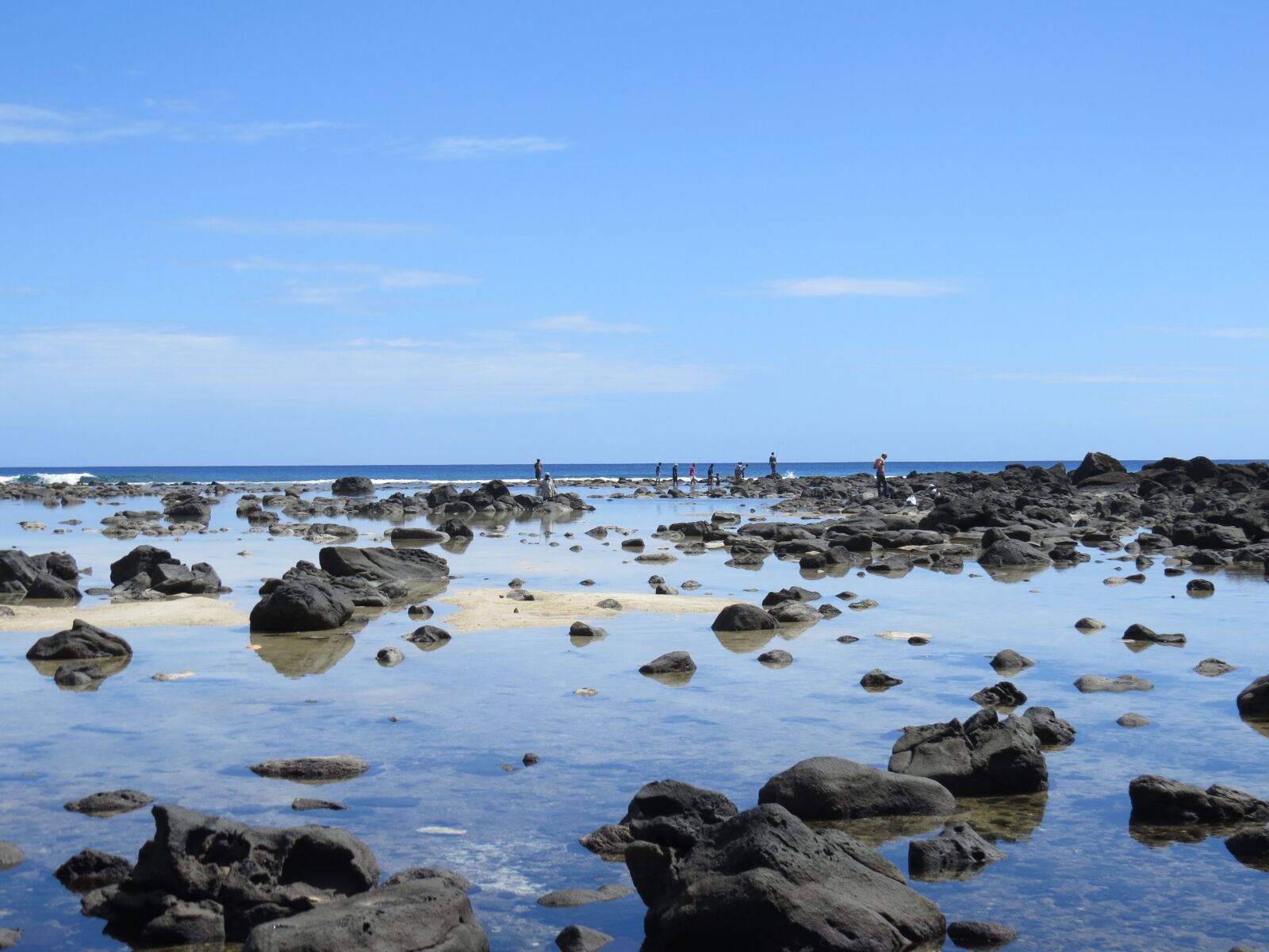 Canon PowerShot SX50 HS sample photo. Blue, stones, blue sky photography
