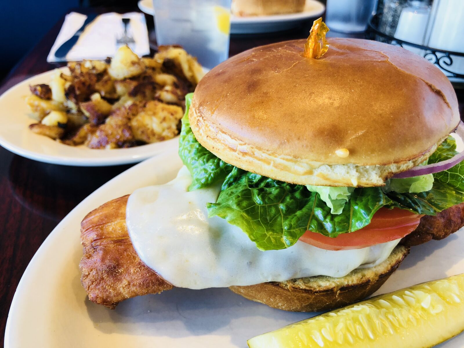 iPhone X back dual camera 4mm f/1.8 sample photo. Fish sandwich, eating out photography