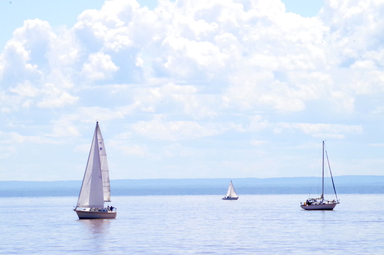 Pentax K-01 sample photo. Blue, sky, boat, clouds photography