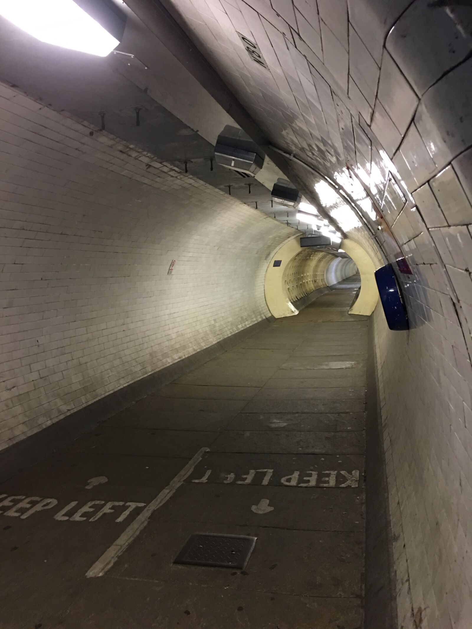 Apple iPhone 6s Plus sample photo. Tunnel, subterranean, pedestrian photography