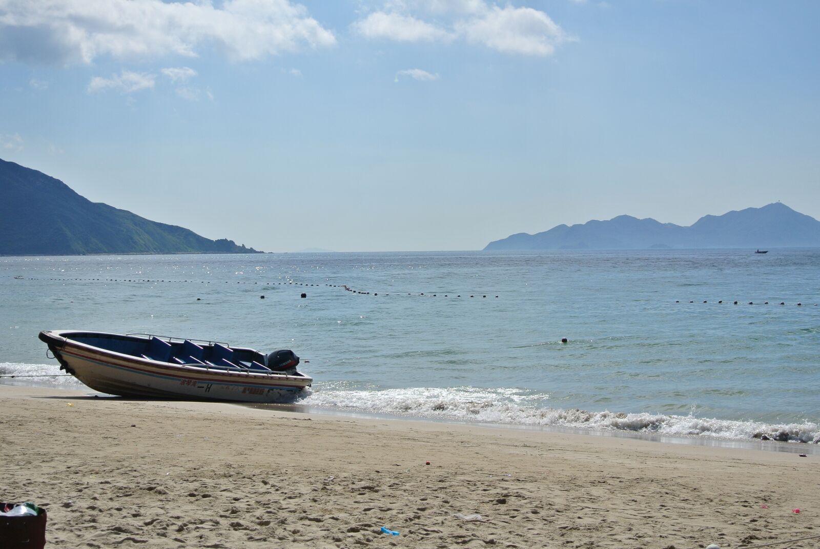 Nikon 1 Nikkor VR 10-30mm F3.5-5.6 sample photo. Sea, blue sky, boat photography