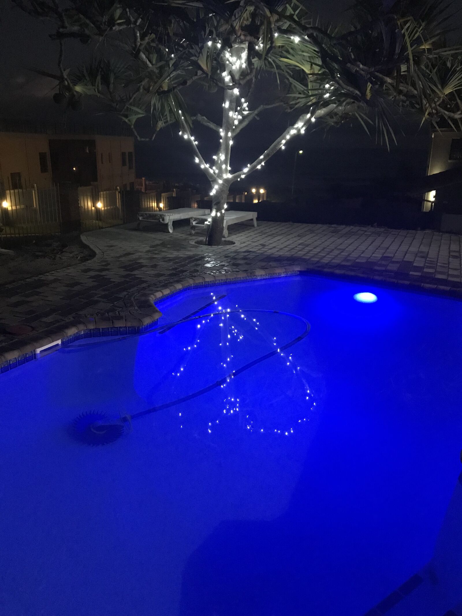 iPhone 7 Plus back dual camera 3.99mm f/1.8 sample photo. Swimmingpool, night, lights photography