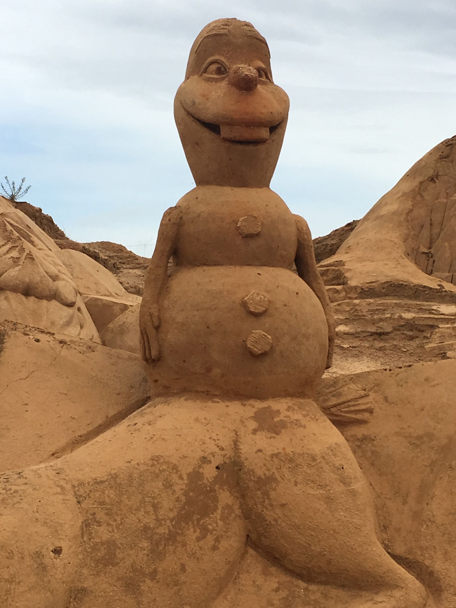 Apple iPhone 6s sample photo. Olaf, frozen, sand photography