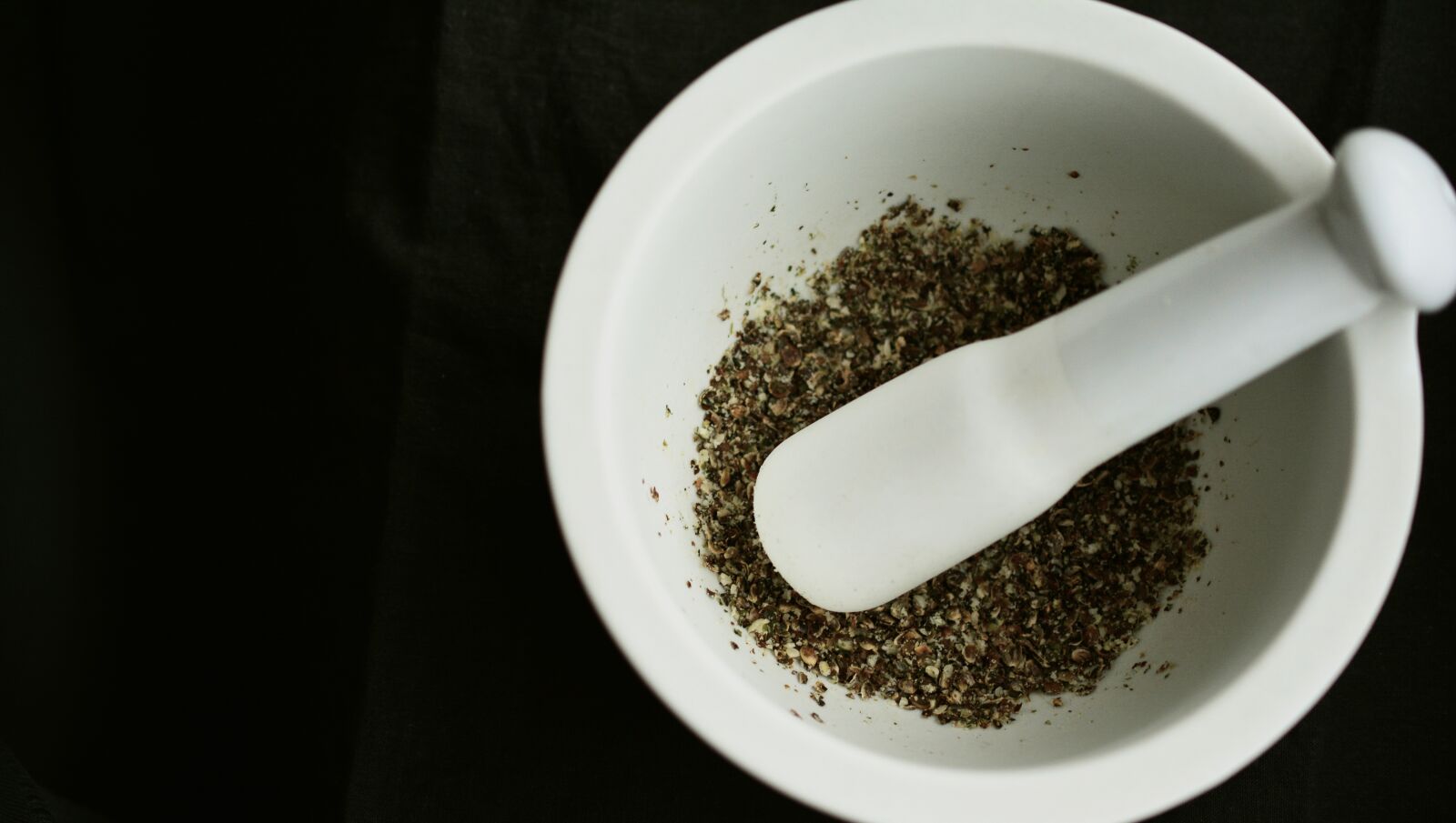 Nikon D5200 sample photo. Mortar, pound, seeds photography