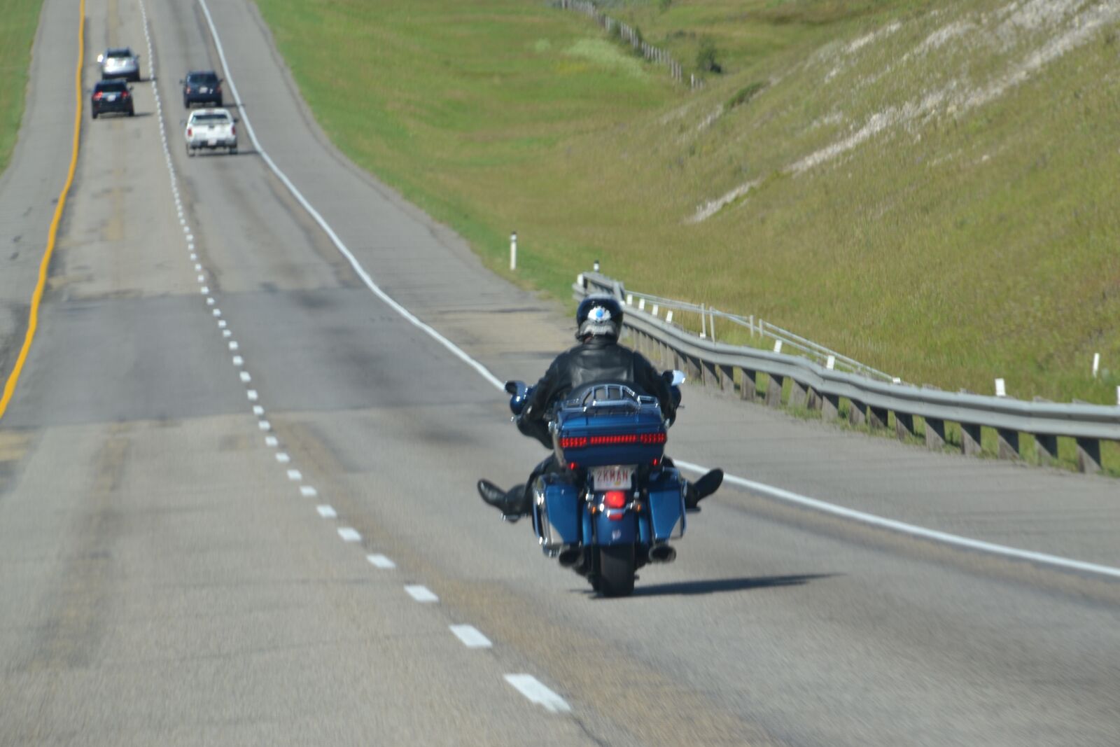 Nikon D3100 sample photo. Biker, highway, road photography