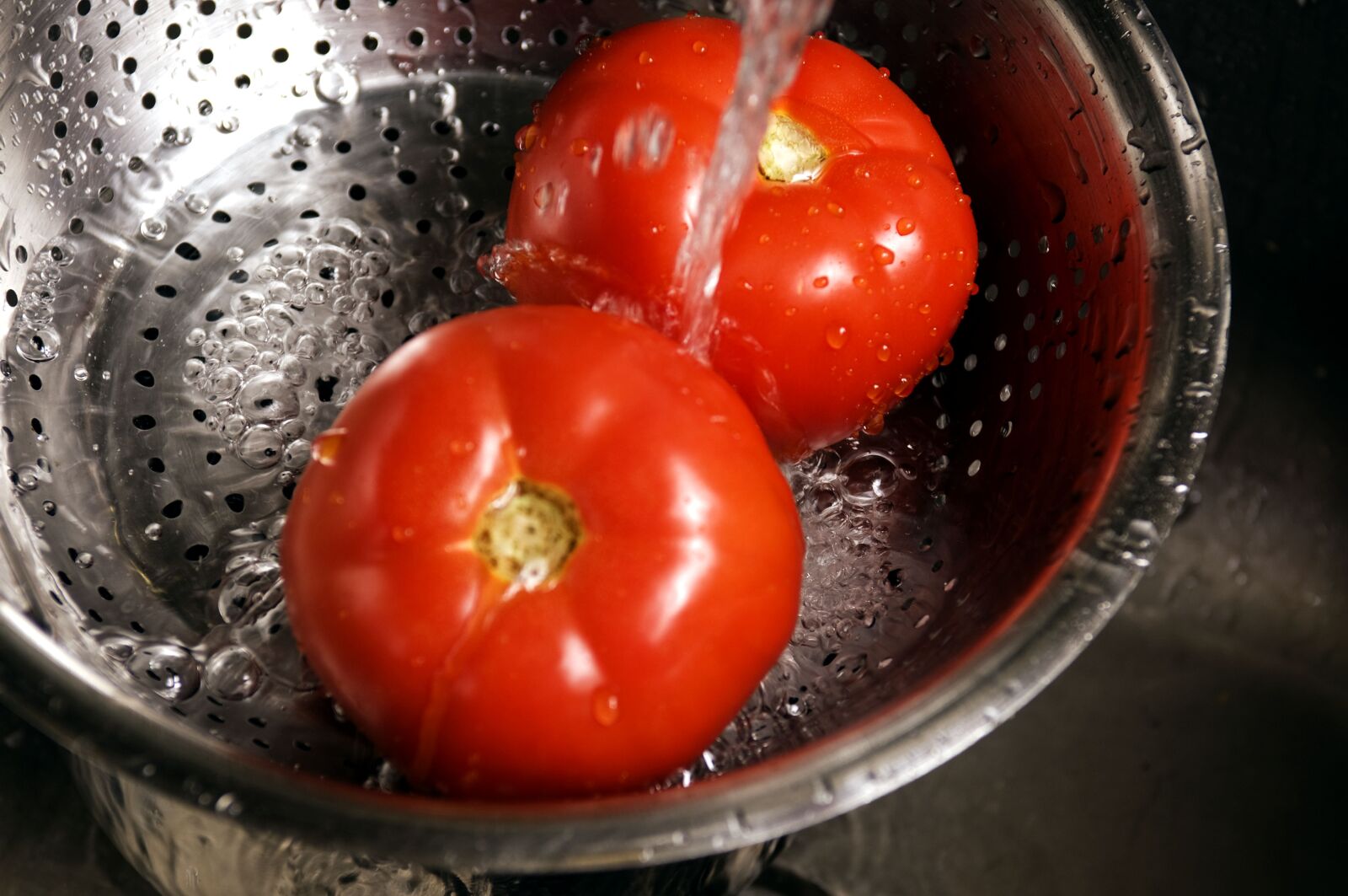 Nikon D300 sample photo. Two, bright red, tomatoes photography