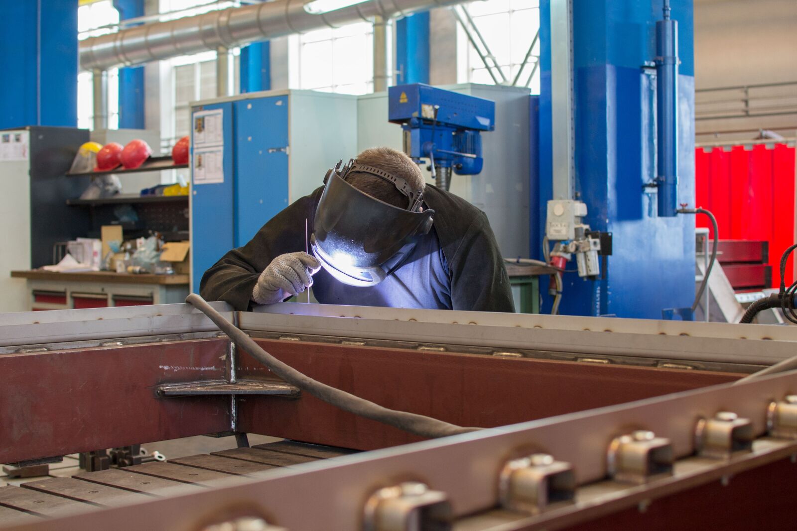 Nikon D3100 sample photo. Welder, plant, people photography