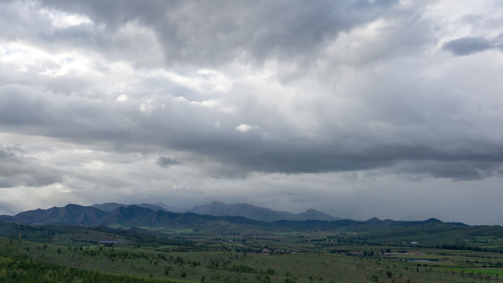 Sony a5100 sample photo. Mountain, dark clouds, cloud photography