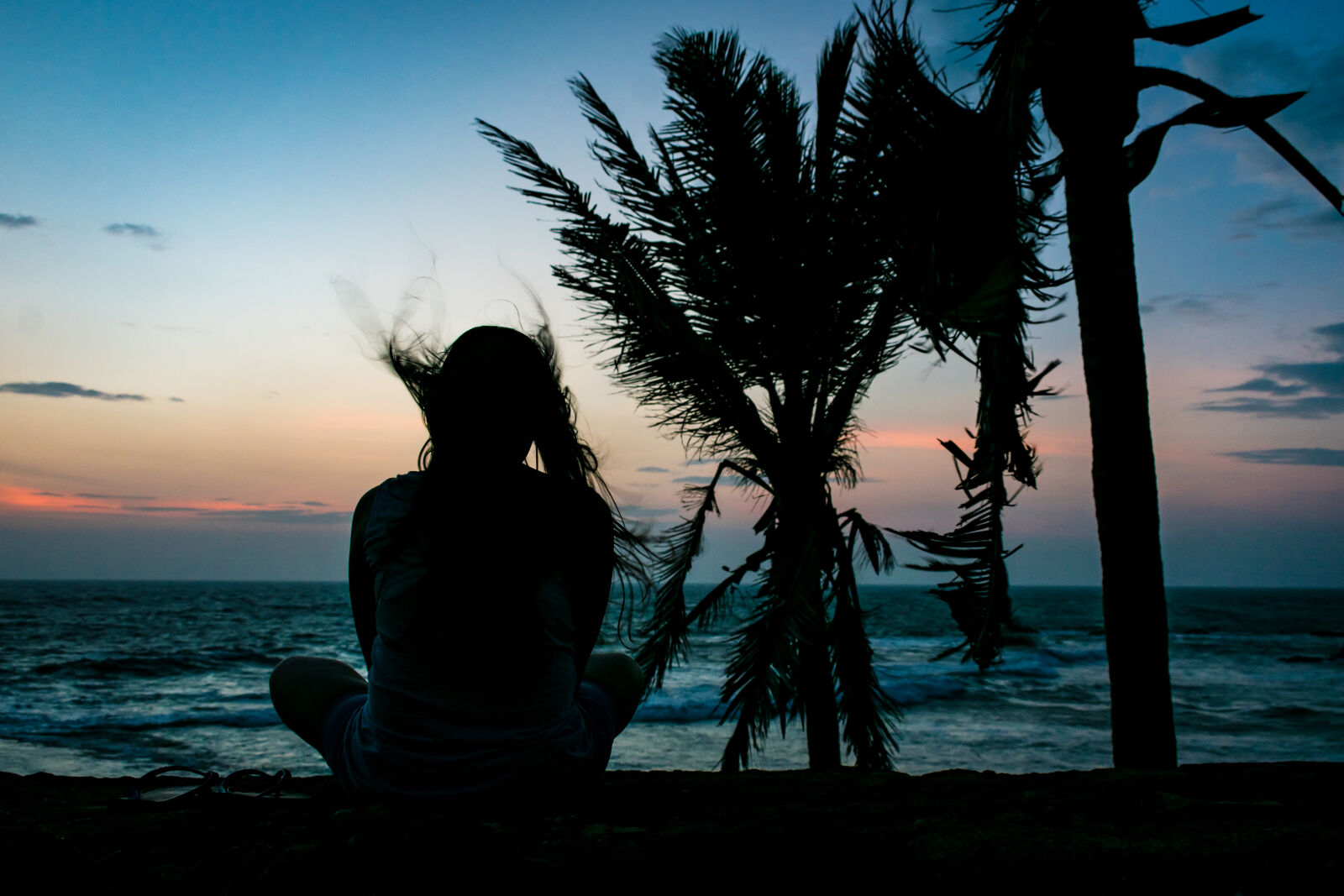 Nikon AF-S DX Nikkor 18-55mm F3.5-5.6G II sample photo. Beach, dusk, girl, sitting photography