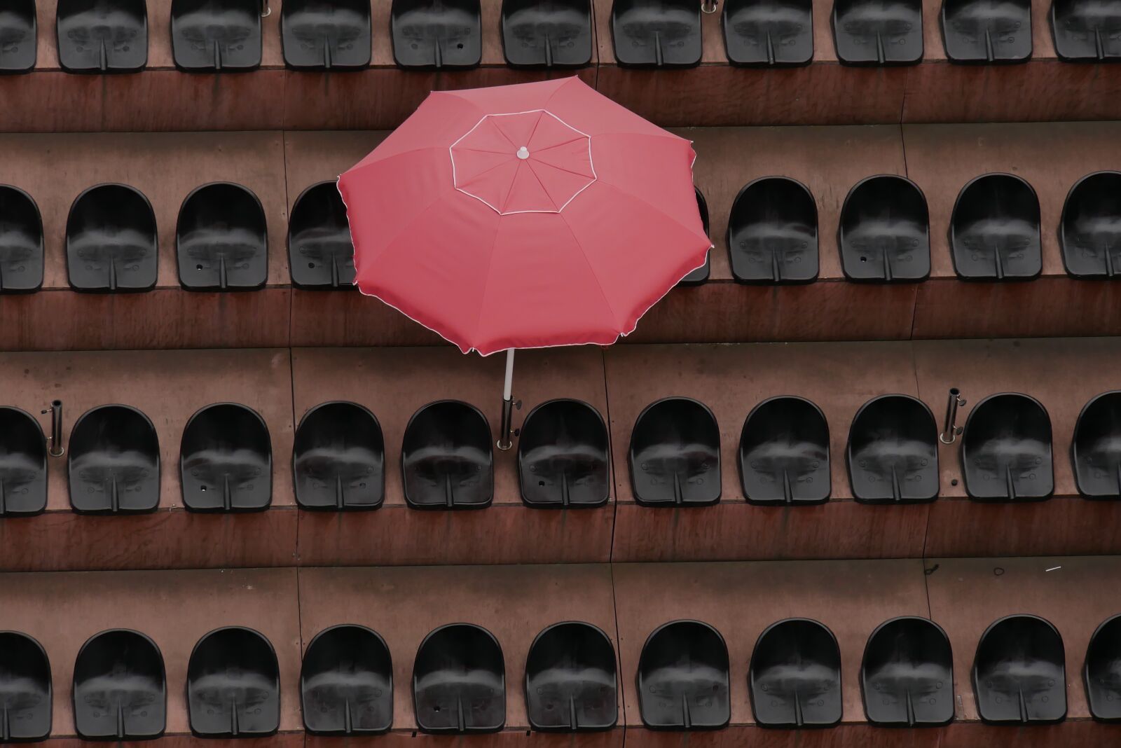 Panasonic DMC-G81 sample photo. Parasol, seats, open-air stage photography