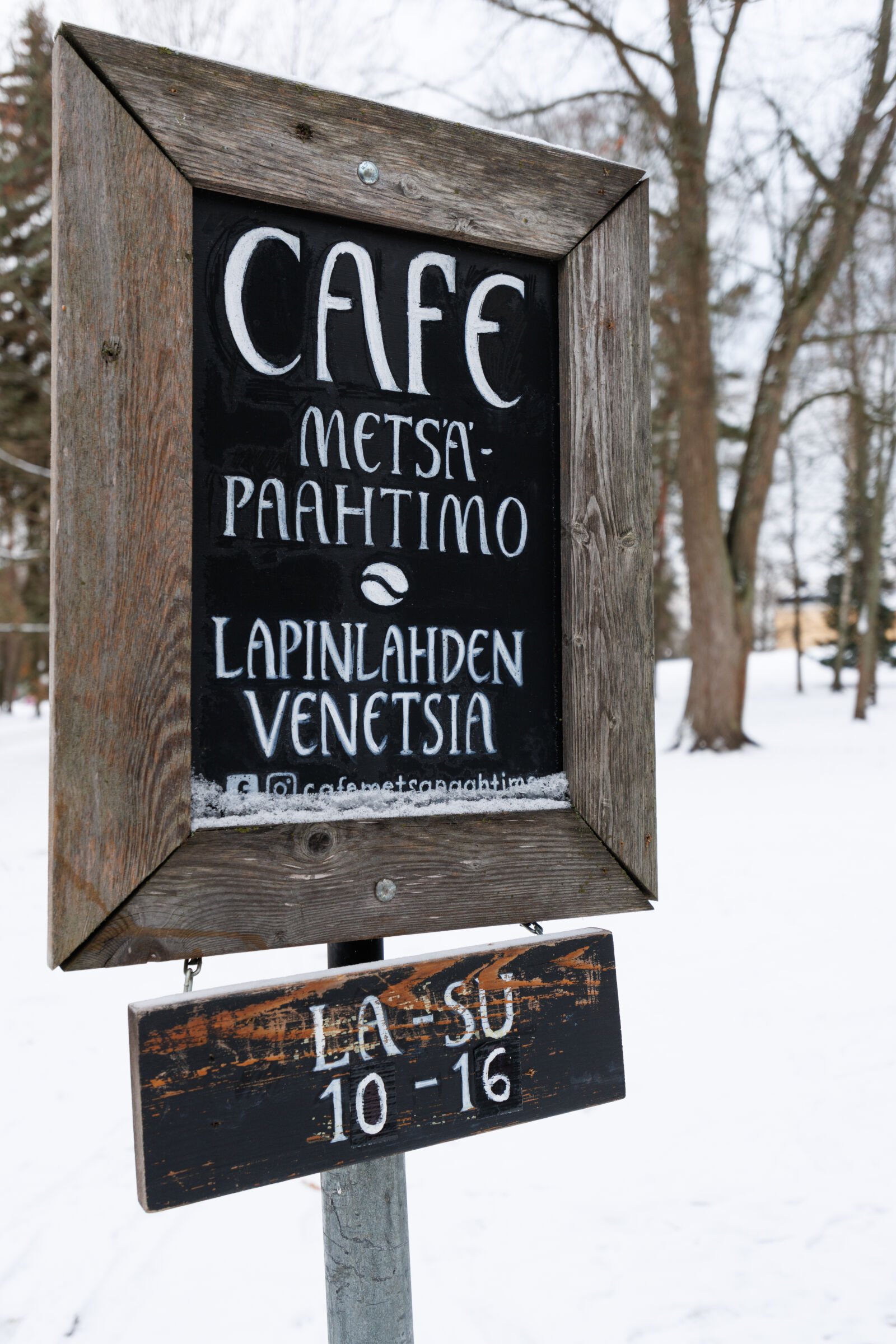 Tamron 11-20mm F2.8 Di III-A RXD sample photo. Winter cafe sign photography