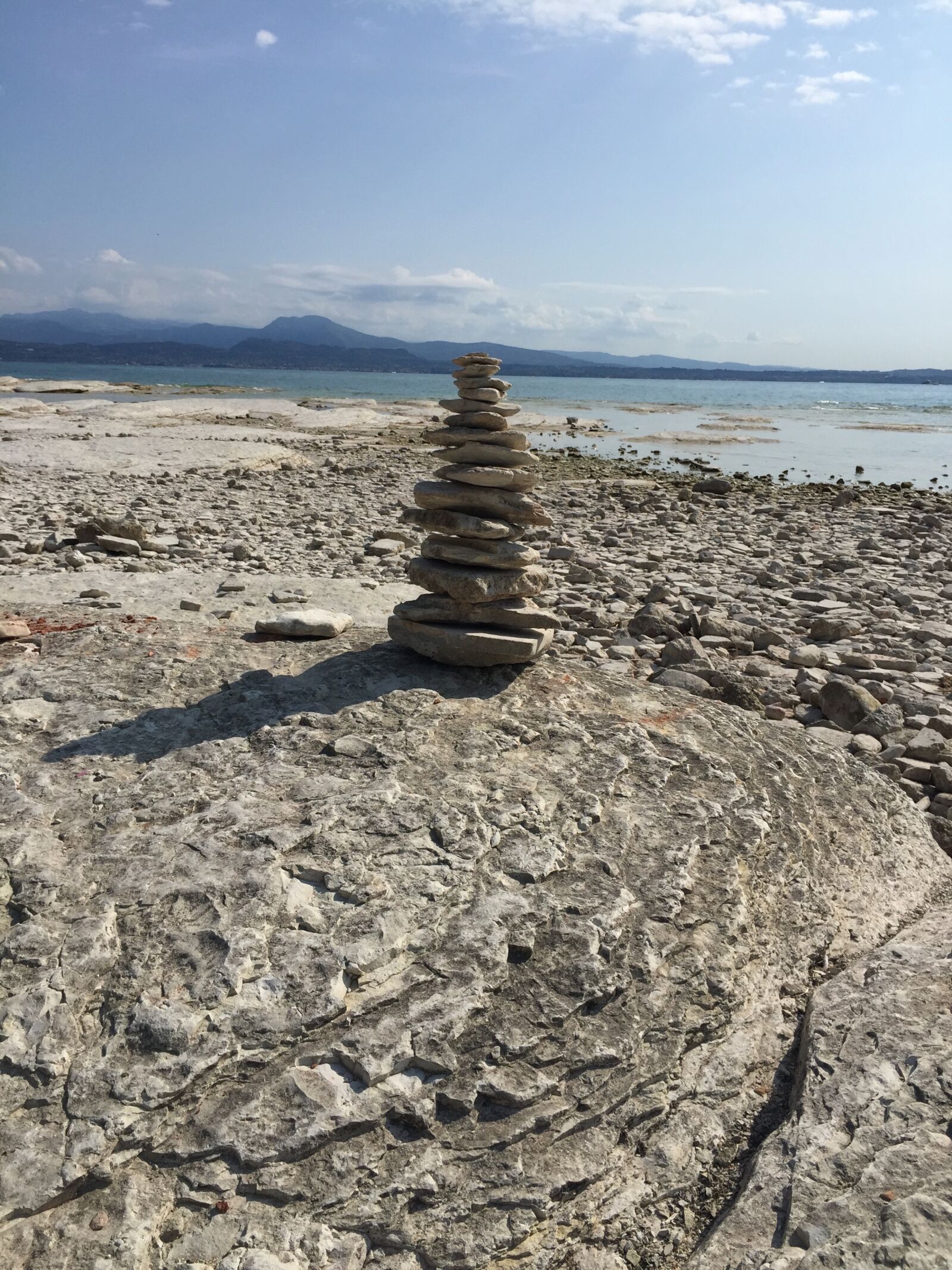 iPhone 6 Plus back camera 4.15mm f/2.2 sample photo. Stone, tower, beach photography