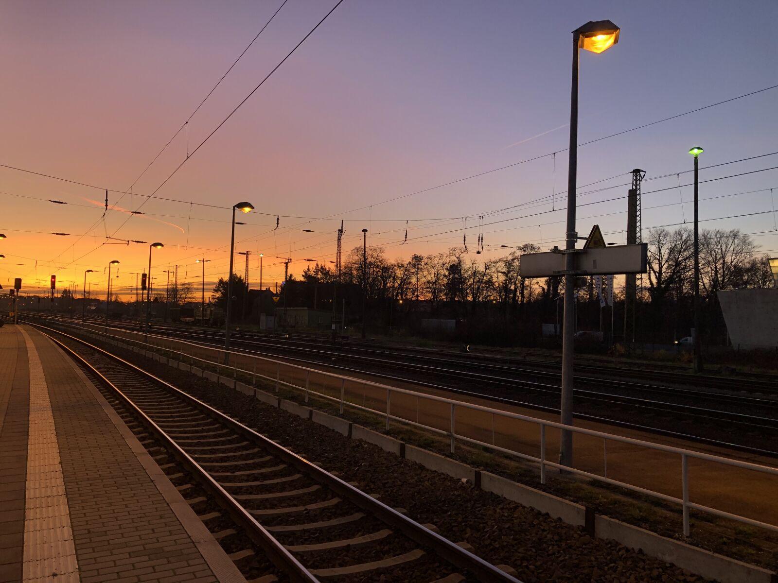 iPhone 8 Plus back dual camera 3.99mm f/1.8 sample photo. Railway station, sunset, sky photography