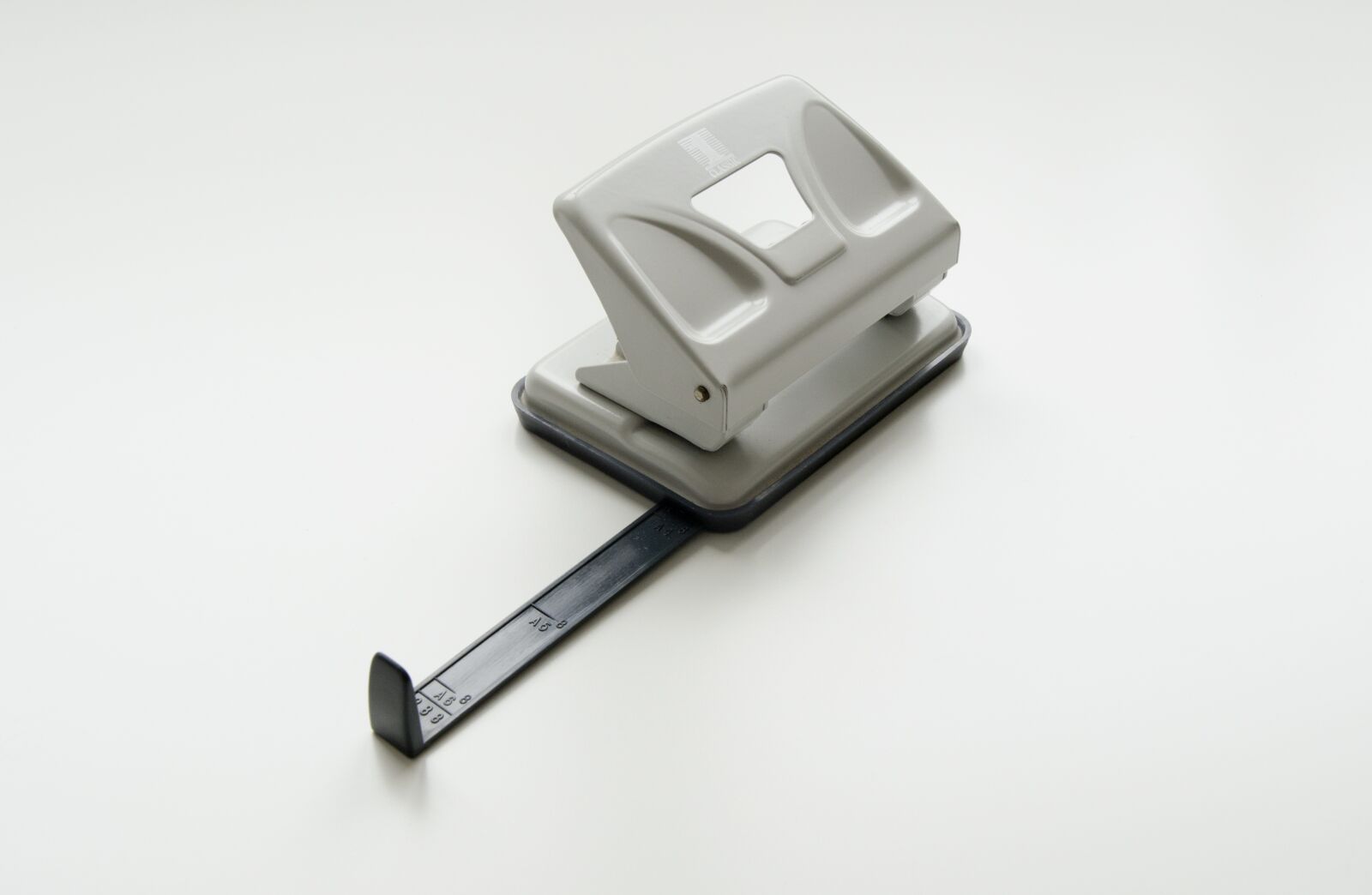 Nikon D5100 sample photo. Hole puncher, two-hole hole photography