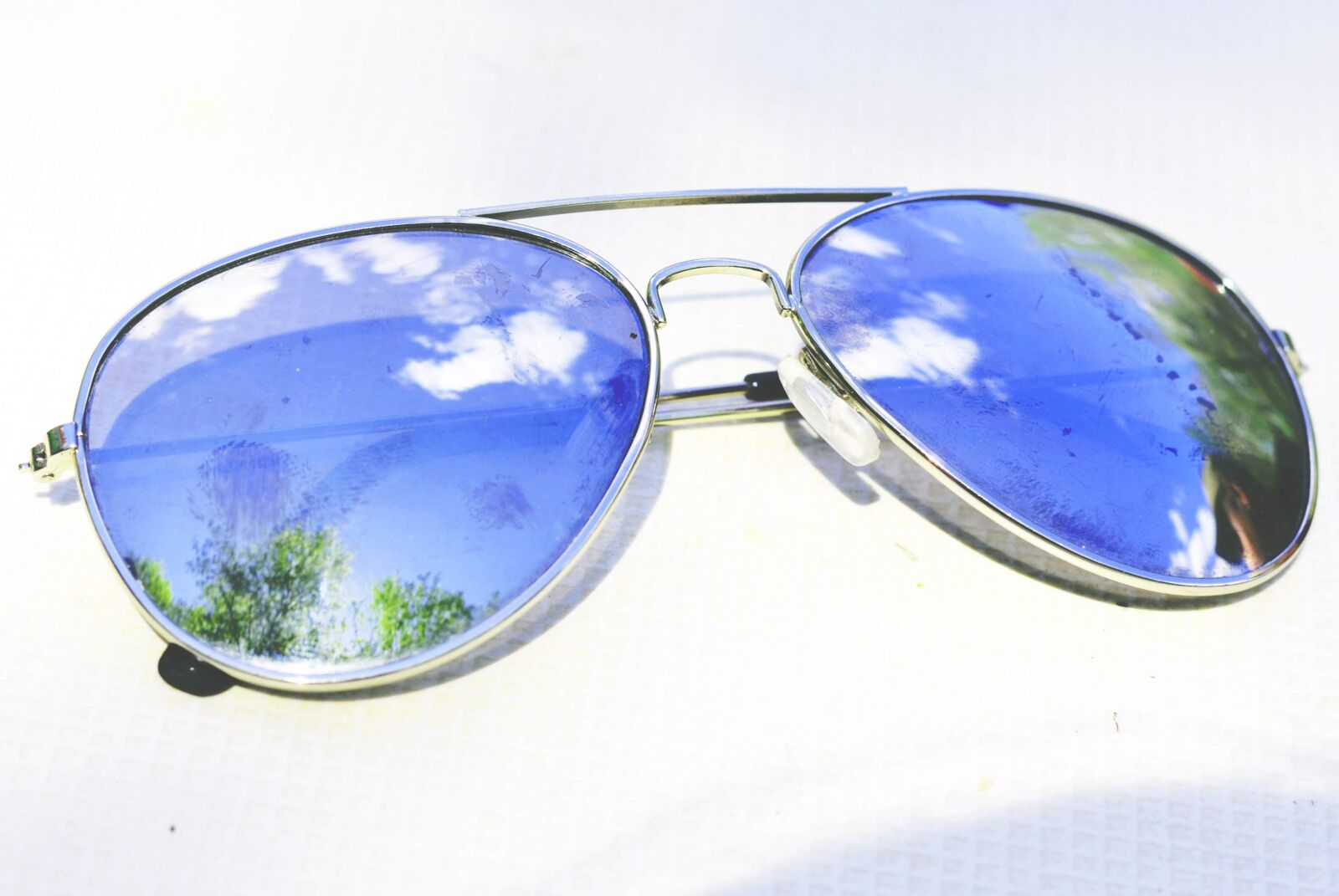 Nikon D3100 sample photo. Sunglasses, reflection, sky photography