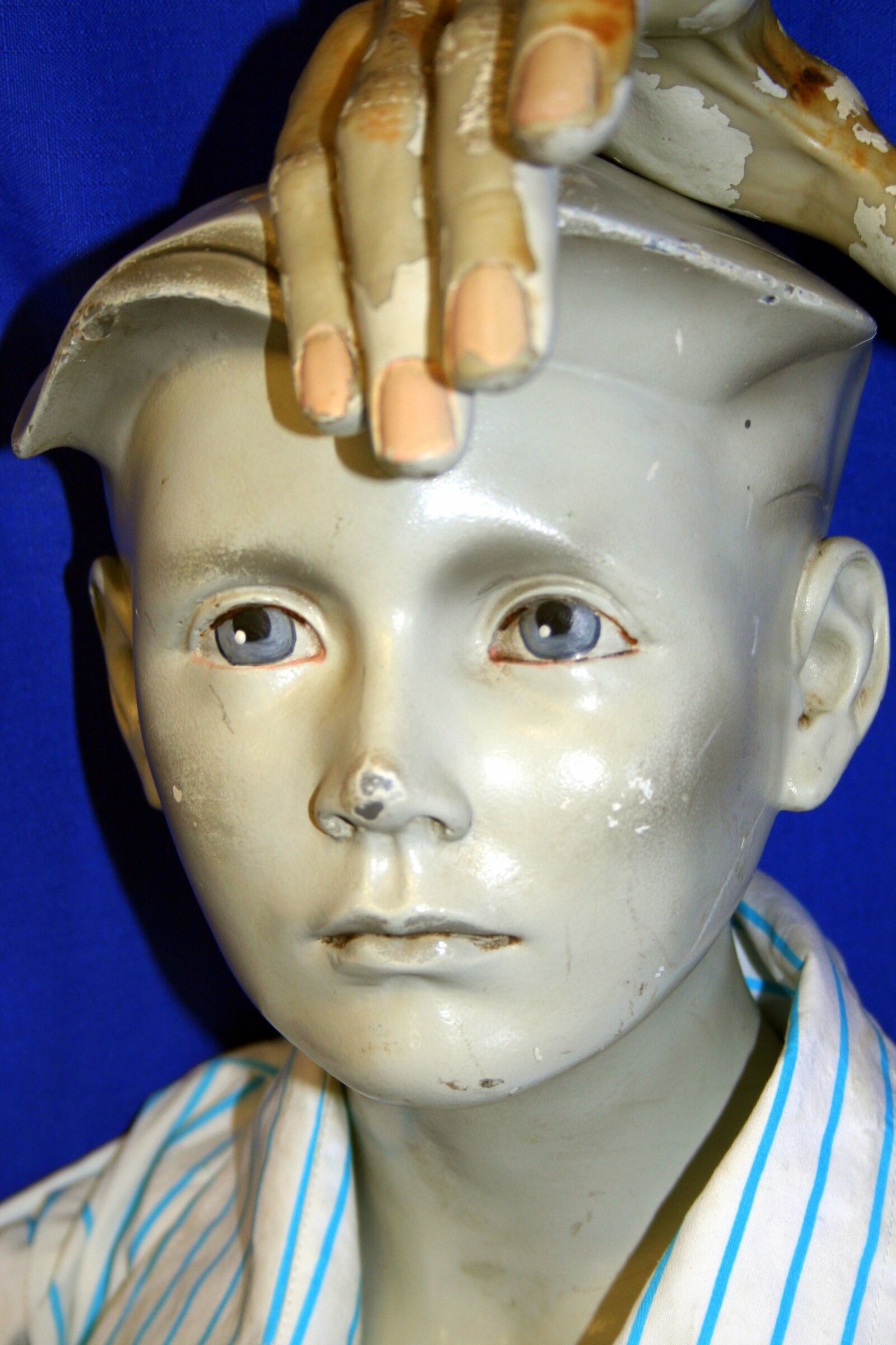 Canon EOS 350D (EOS Digital Rebel XT / EOS Kiss Digital N) sample photo. Sculpture, child, face photography