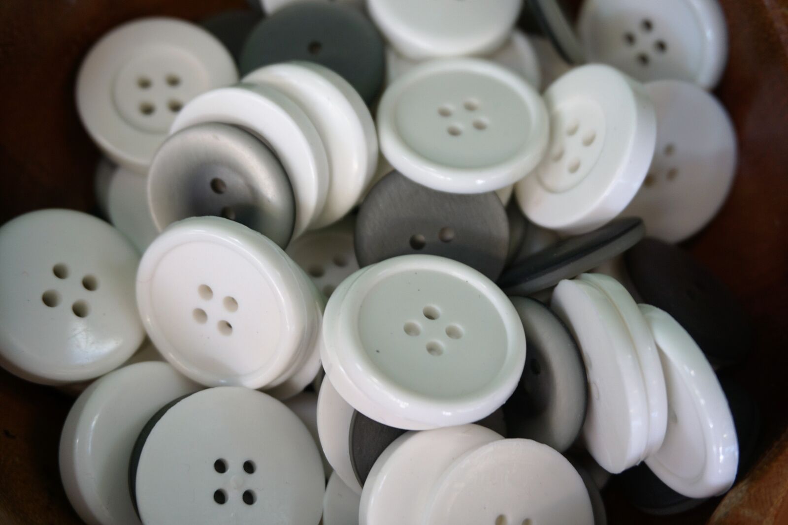 Sony a6000 sample photo. Buttons, white, cloth photography