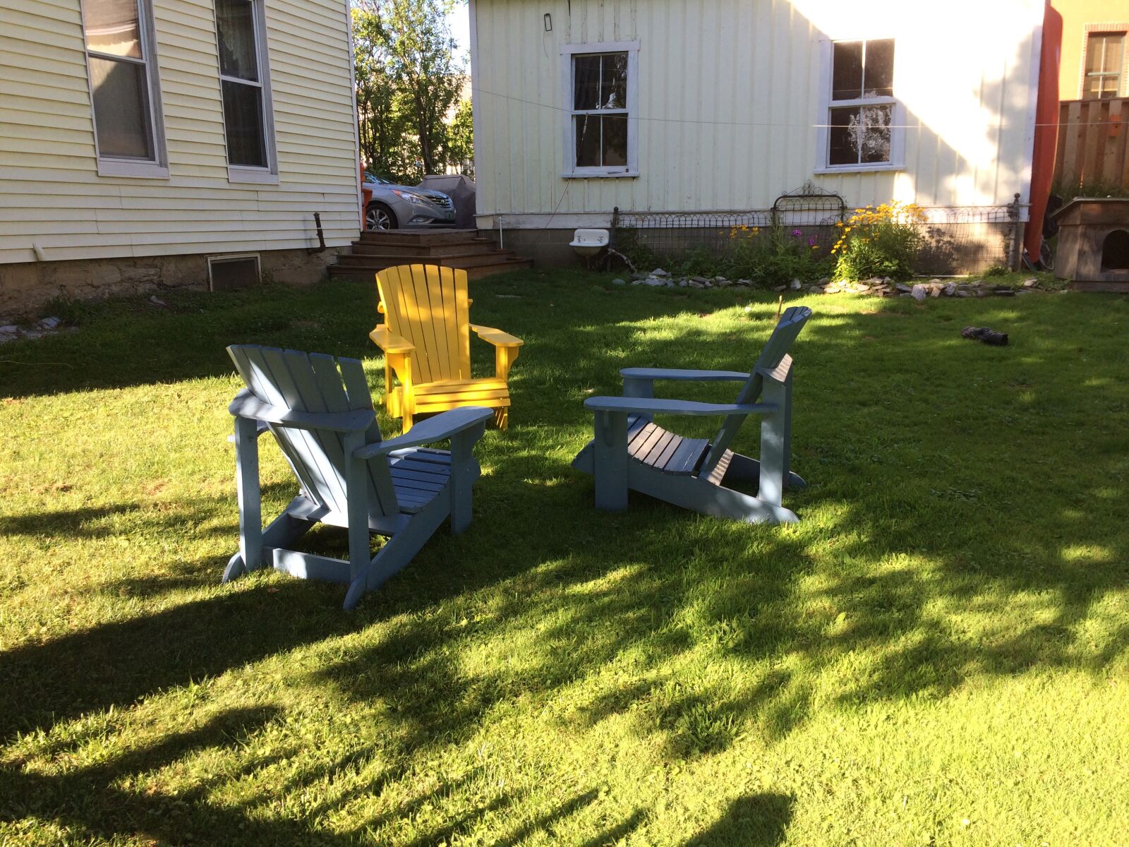 iPhone 5s back camera 4.15mm f/2.2 sample photo. Adirondack chairs, shadows, relaxation photography