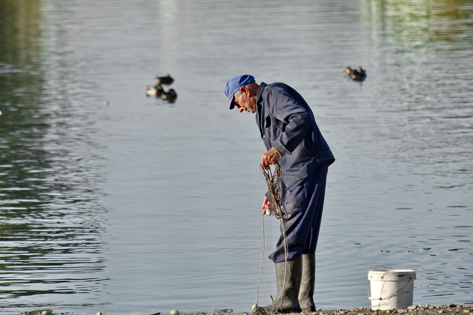 Nikon D5500 sample photo. Pensioner, portrait, fisherman, water photography